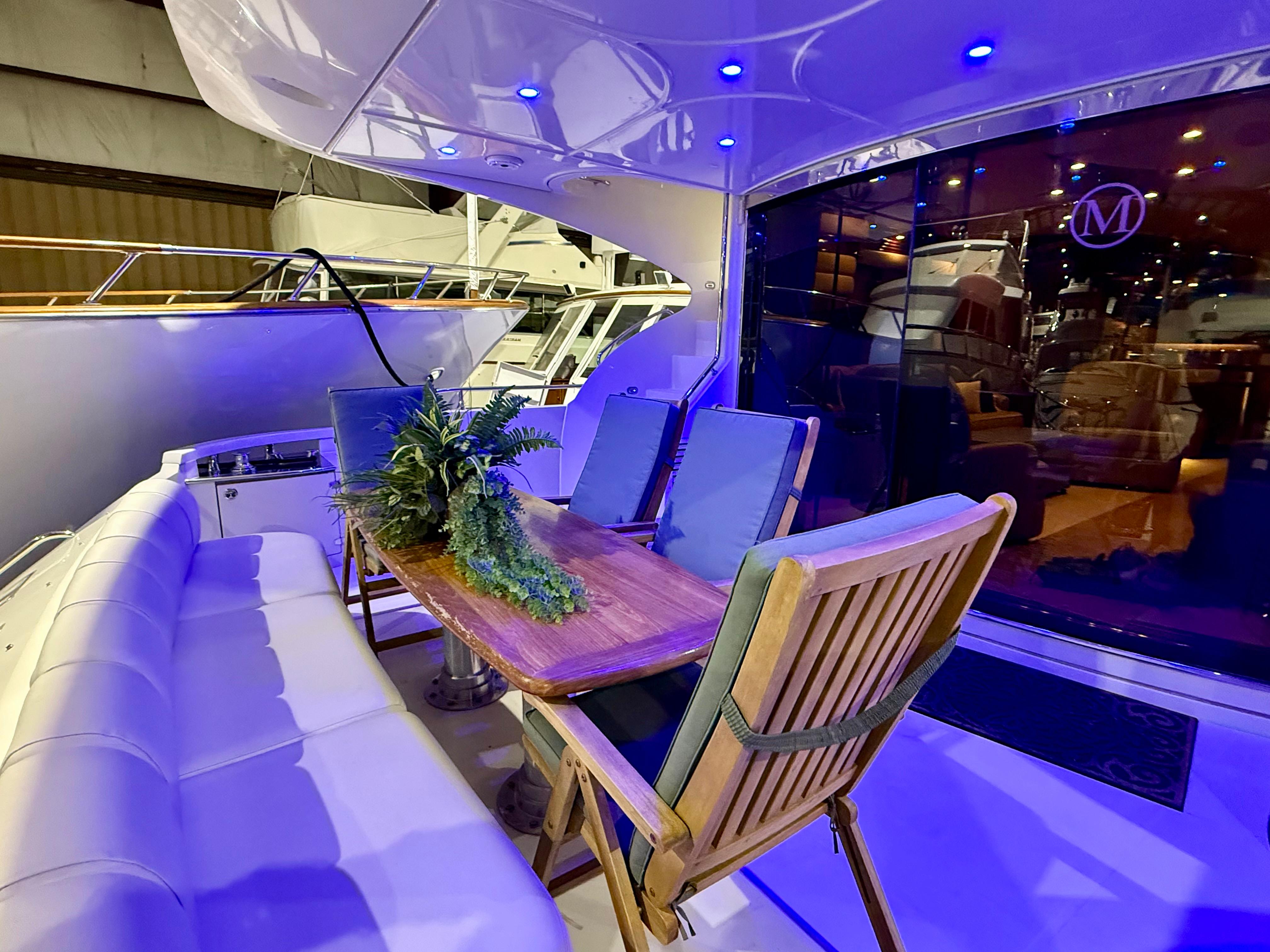 Marquis-65 2005-Tenacity FL-US-Luxurious 2005 Marquis 65 yacht deck with elegant seating and ambient lighting.-9656261 | Thumbnail