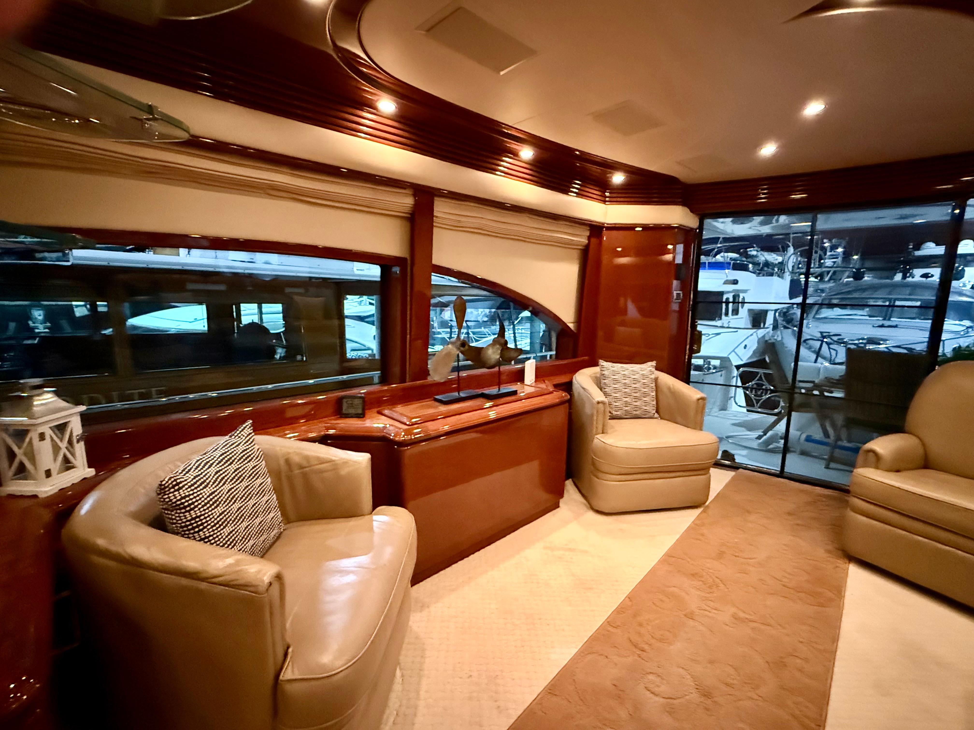 Marquis-65 2005-Tenacity FL-US-Luxurious interior of a 2005 Marquis 65 yacht with elegant seating and large windows.-9656261 | Thumbnail