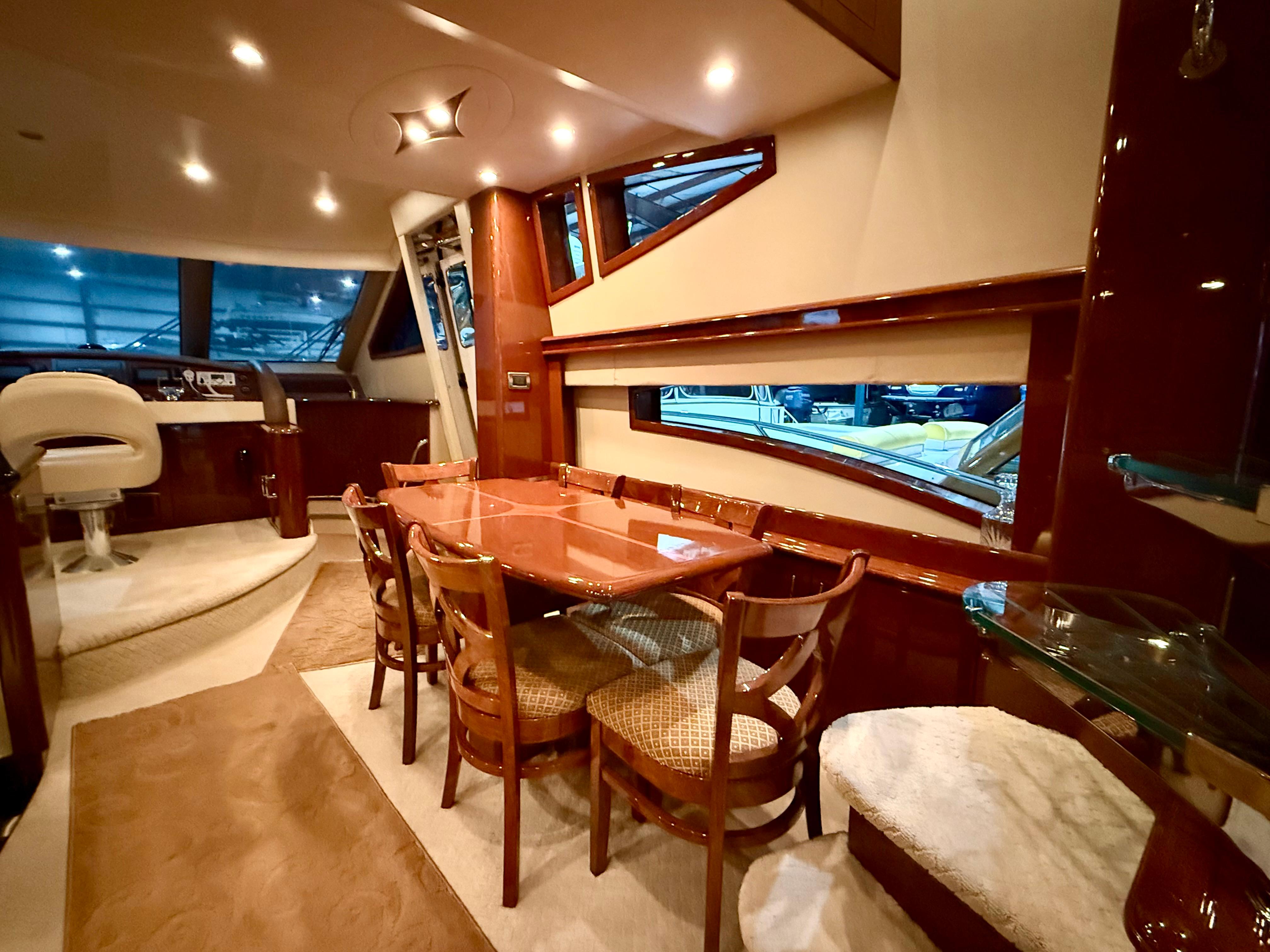 Marquis-65 2005-Tenacity FL-US-Luxurious interior of a 2005 Marquis 65 yacht with elegant dining area.-9656261 | Thumbnail