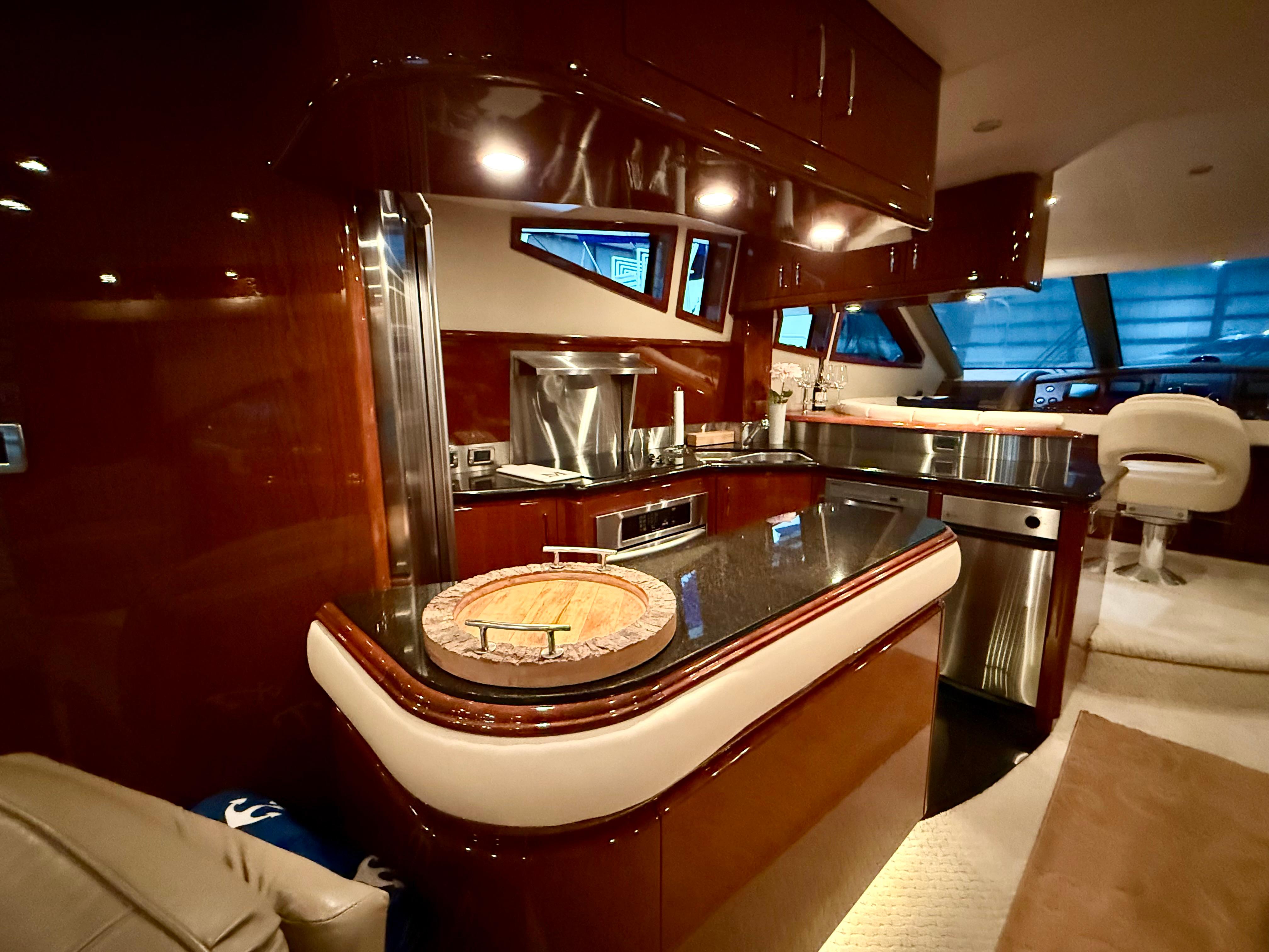 Marquis-65 2005-Tenacity FL-US-Luxurious interior of a 2005 Marquis 65 yacht with modern kitchen amenities.-9656261 | Thumbnail