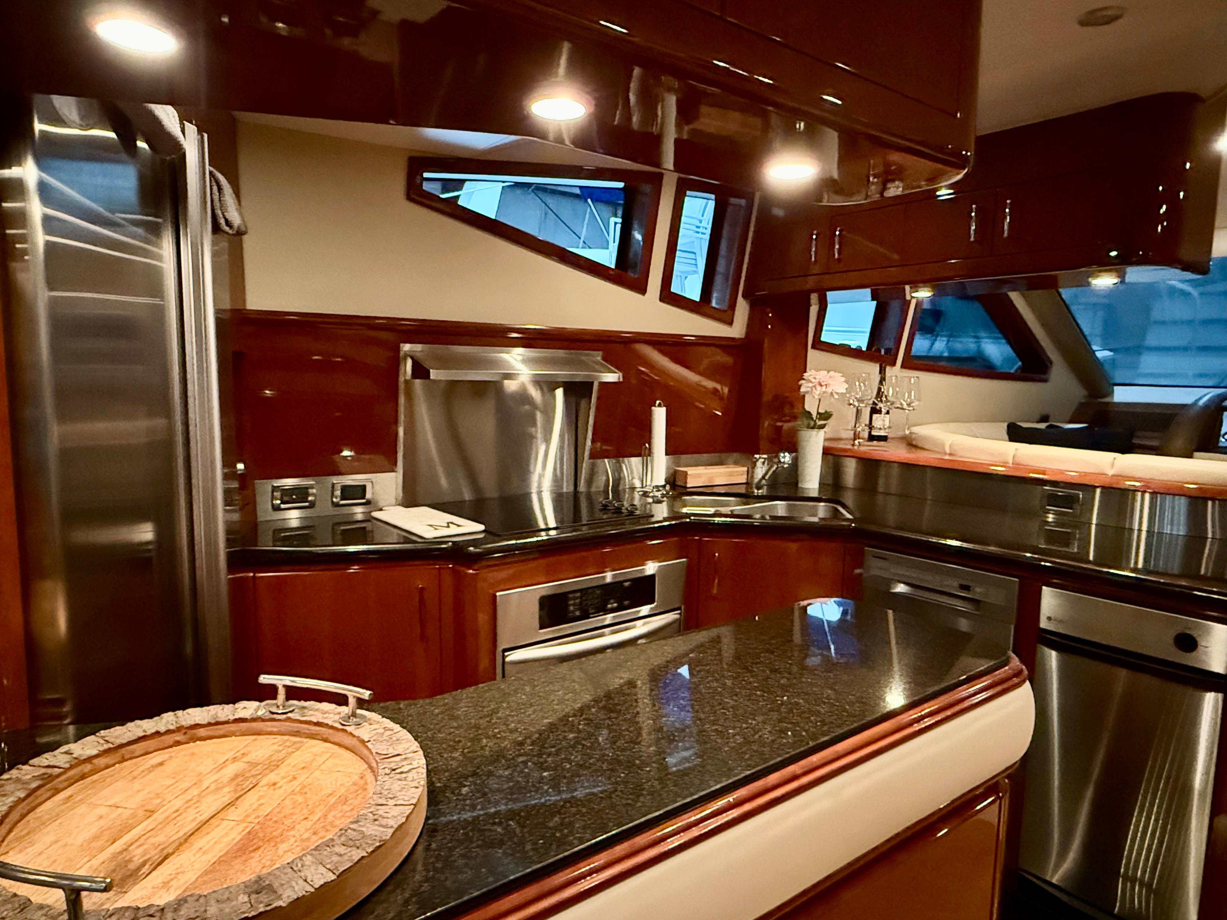 Marquis-65 2005-Tenacity FL-US-Luxurious kitchen interior of a 2005 Marquis 65 yacht with modern appliances.-9656261 | Thumbnail