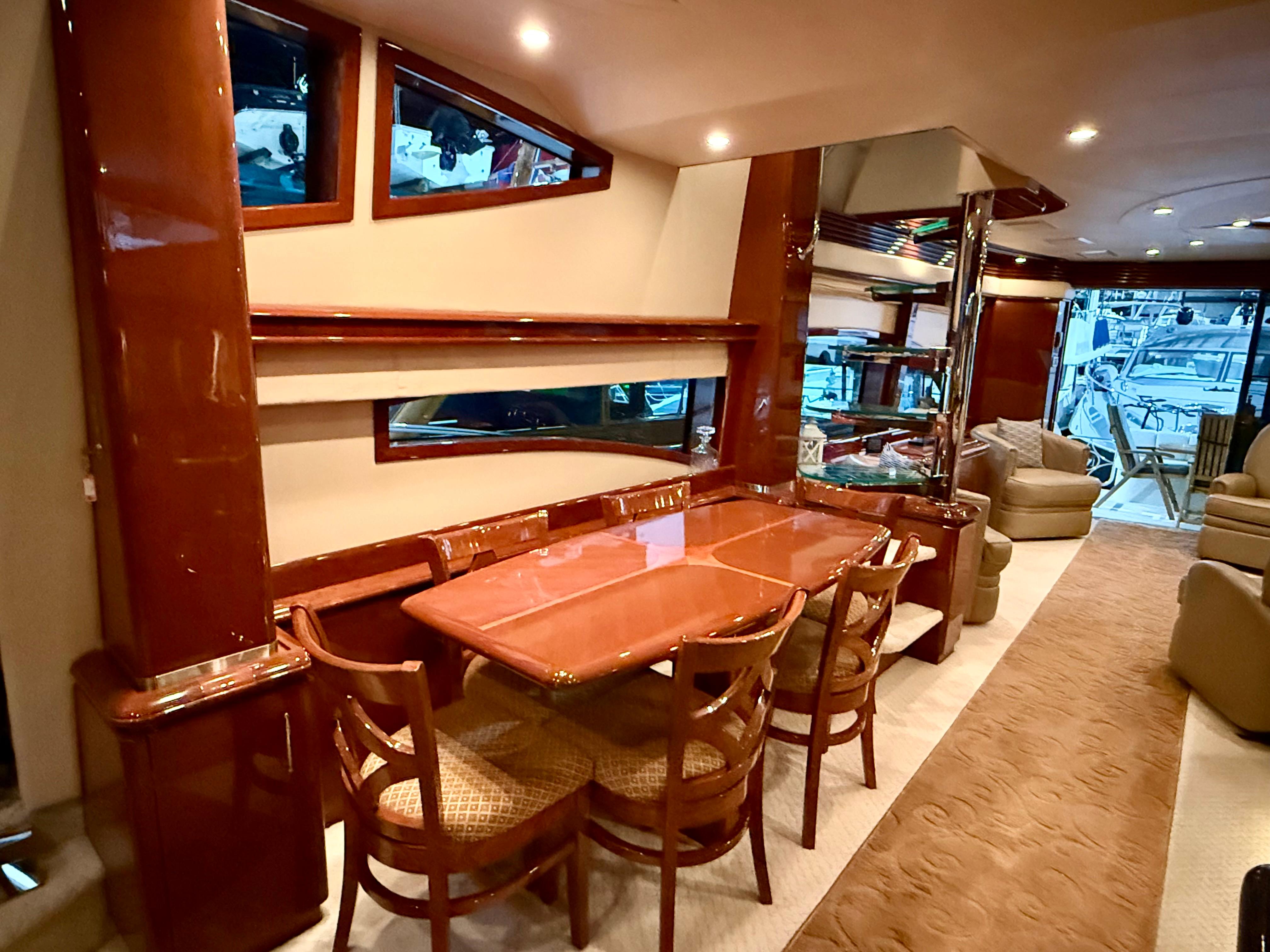 Marquis-65 2005-Tenacity FL-US-Luxurious interior of a 2005 Marquis 65 yacht with elegant dining area.-9656261 | Thumbnail
