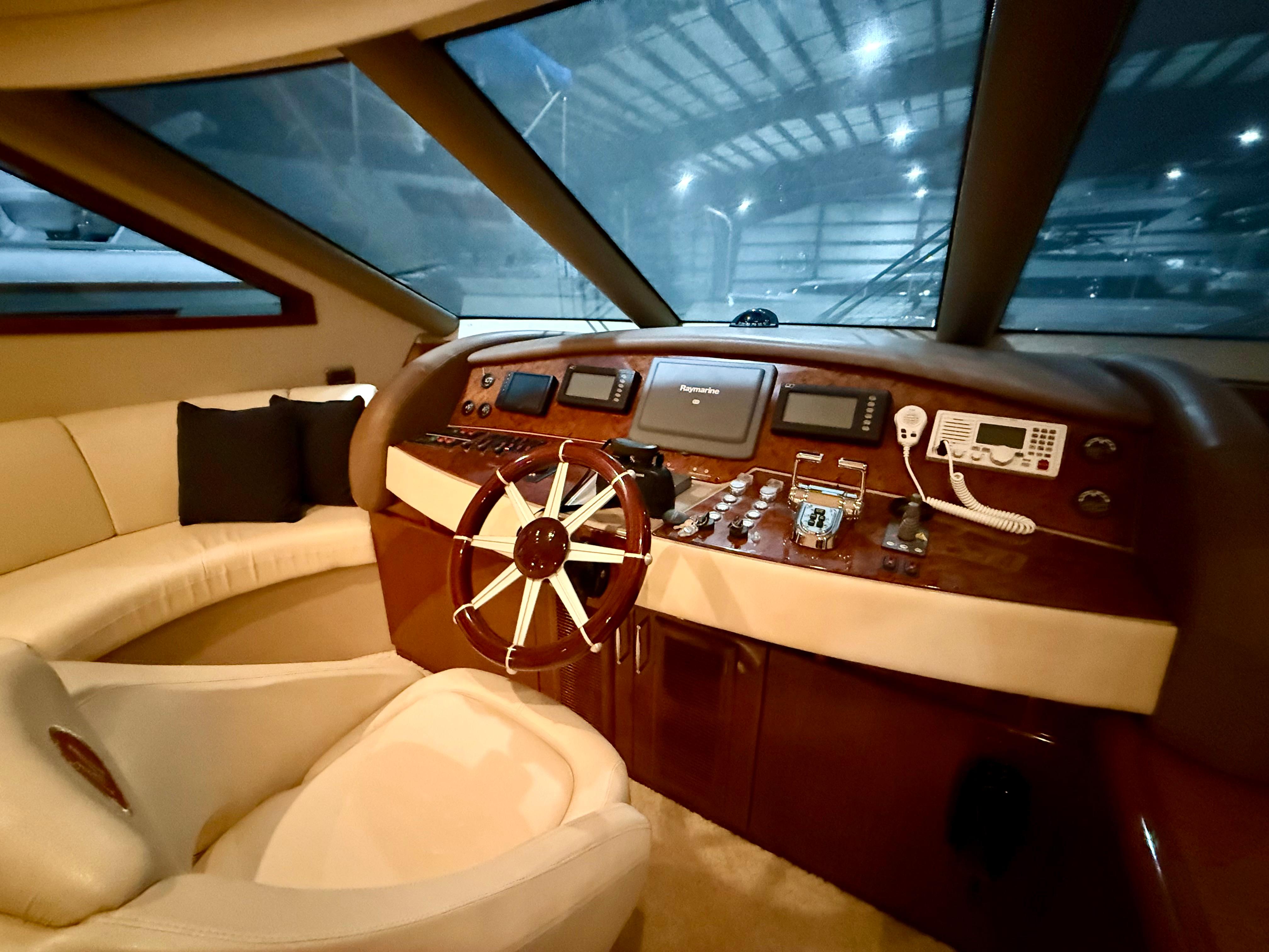 Marquis-65 2005-Tenacity FL-US-Luxurious 2005 Marquis 65 yacht helm with plush seating and advanced navigation controls.-9656261 | Thumbnail