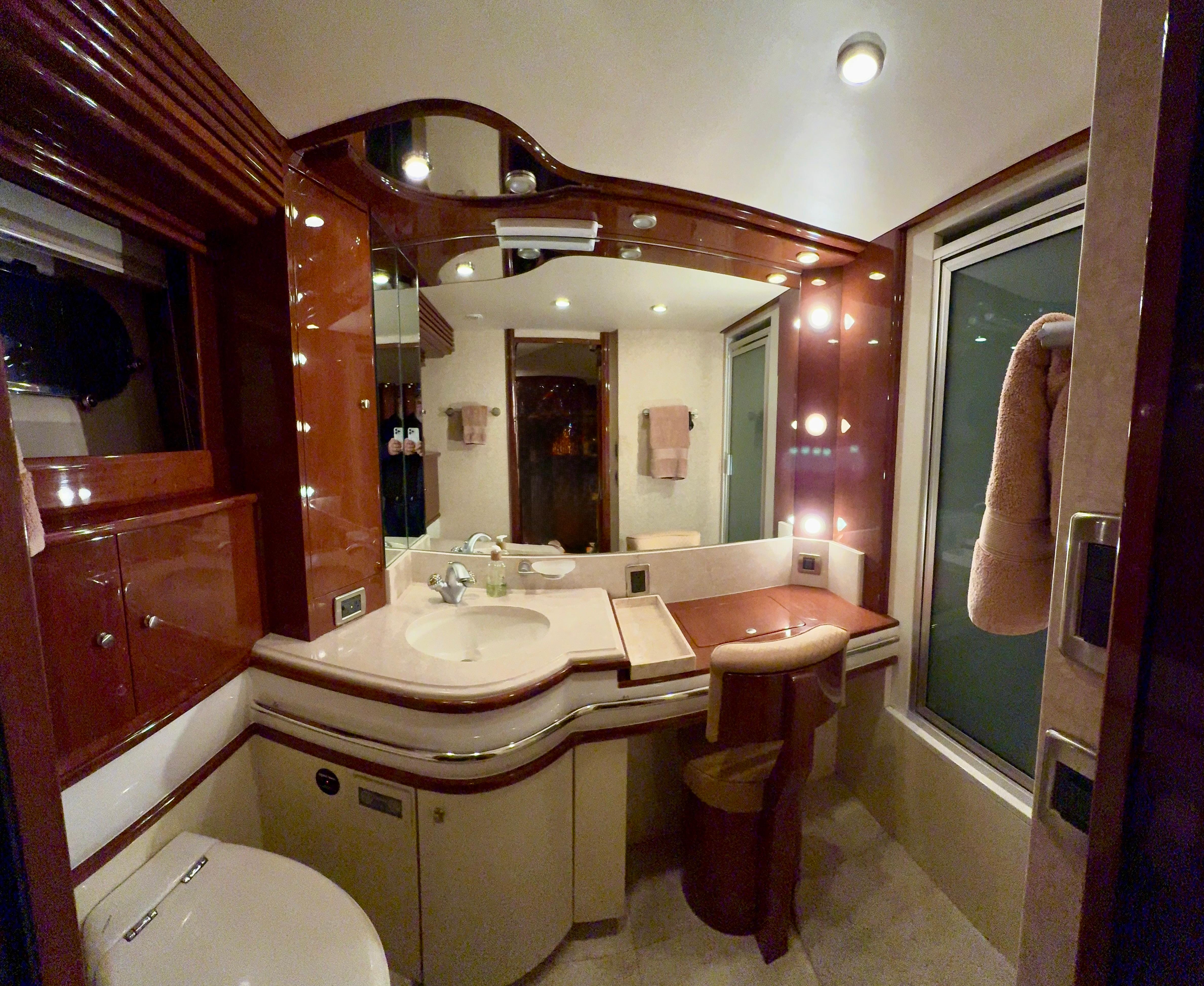 Marquis-65 2005-Tenacity FL-US-Luxurious bathroom interior in a 2005 Marquis 65 yacht, featuring elegant wood finishes and modern amenities.-9656261 | Thumbnail
