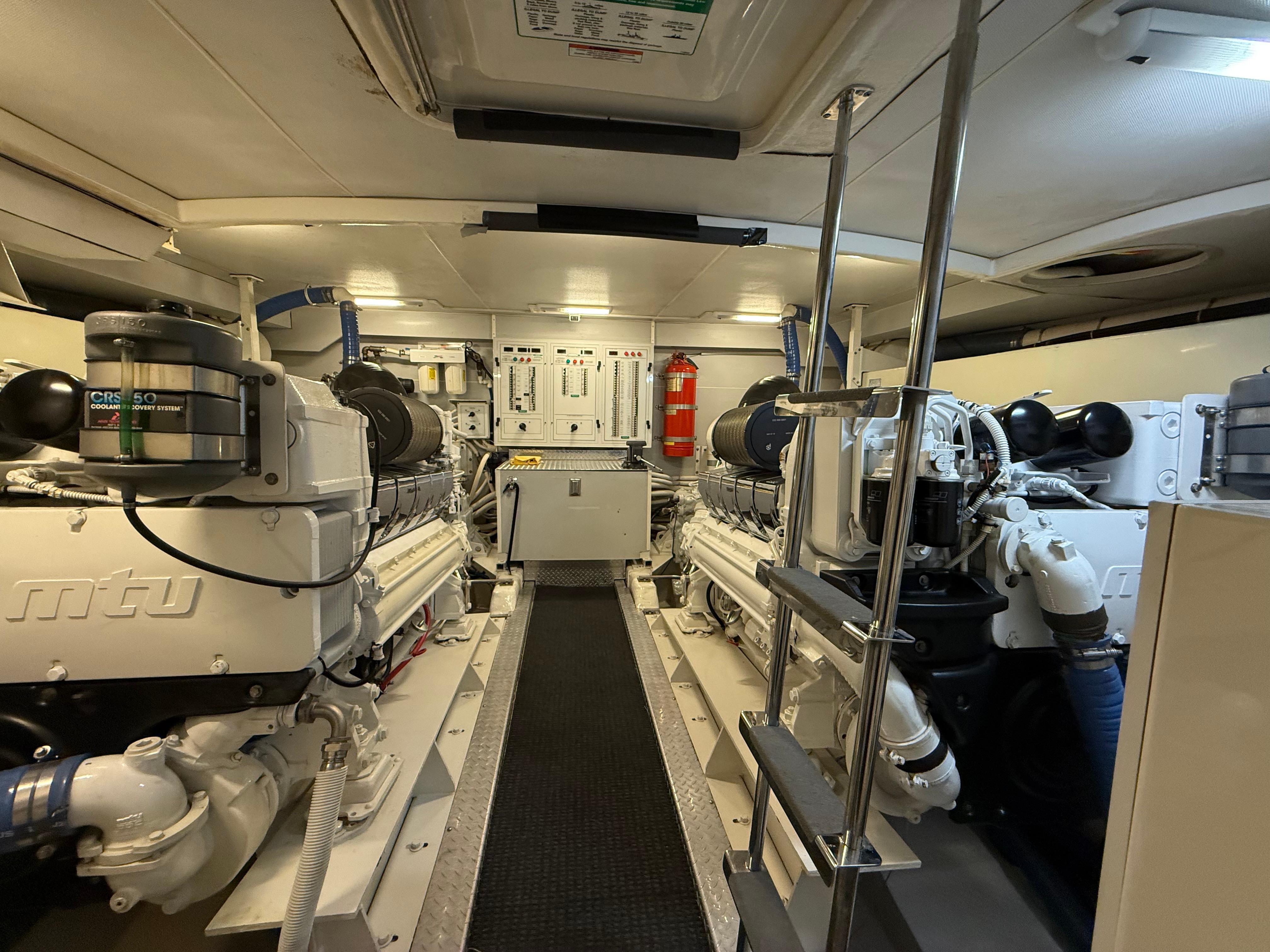 Marquis-65 2005-Tenacity FL-US-Engine room of a 2005 Marquis 65 yacht, featuring dual MTU engines.-9656261 | Thumbnail