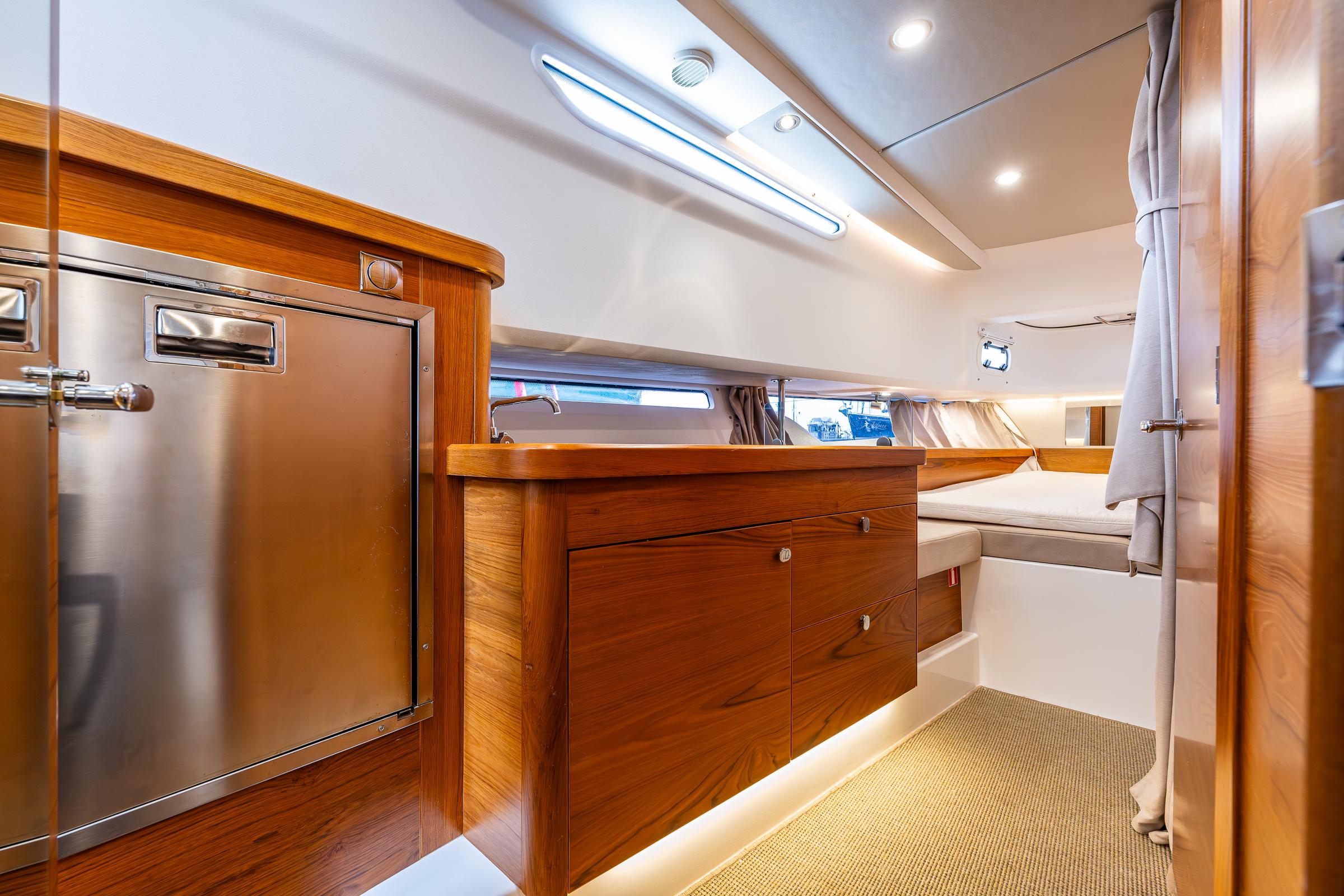 Nimbus-C11 2021-RYLEA ROSE WA-US-Luxurious interior of 2021 Nimbus C11 yacht with wooden cabinetry and modern lighting.-9586288 | Thumbnail