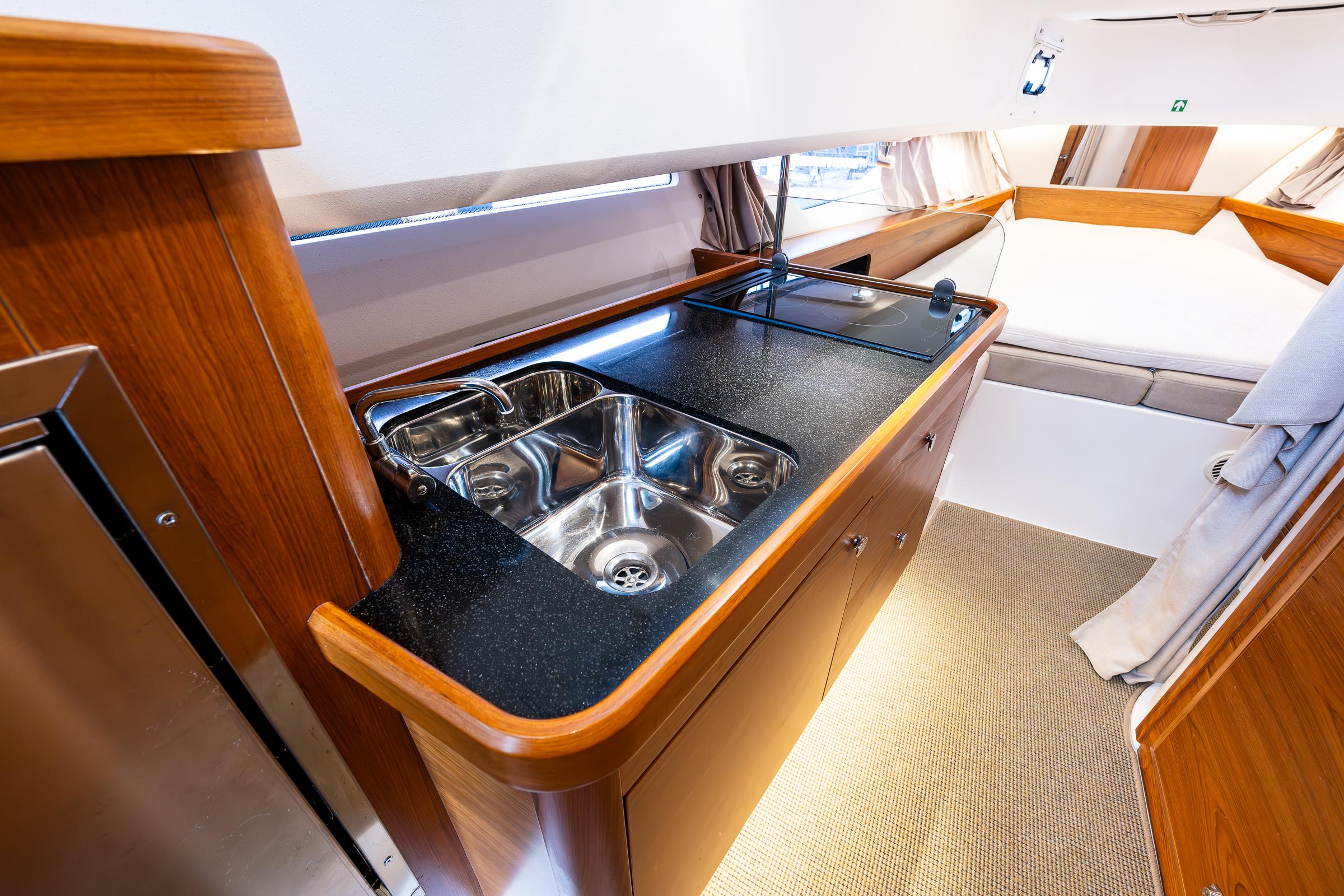 Nimbus-C11 2021-RYLEA ROSE WA-US-Luxurious Nimbus C11 2021 yacht interior with modern kitchenette and cozy sleeping area.-9586288 | Thumbnail