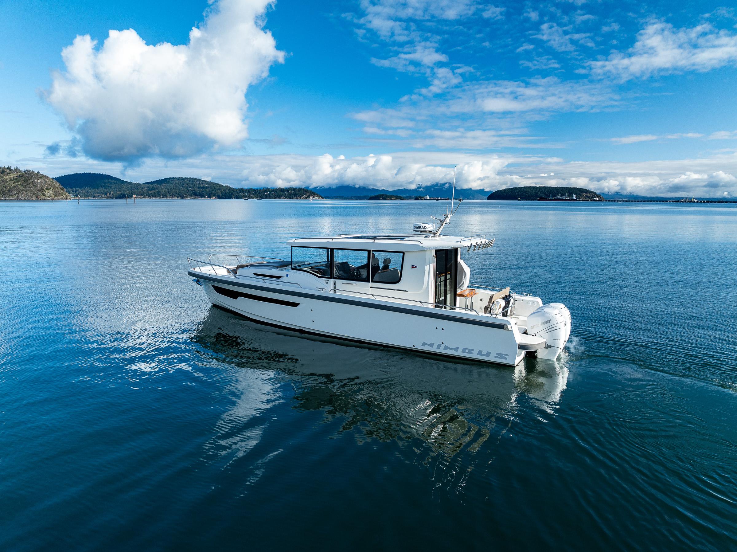 Nimbus-C11 2021-RYLEA ROSE WA-US-Nimbus C11 2021 boat cruising on a serene lake under a blue sky.-9586288 | Thumbnail