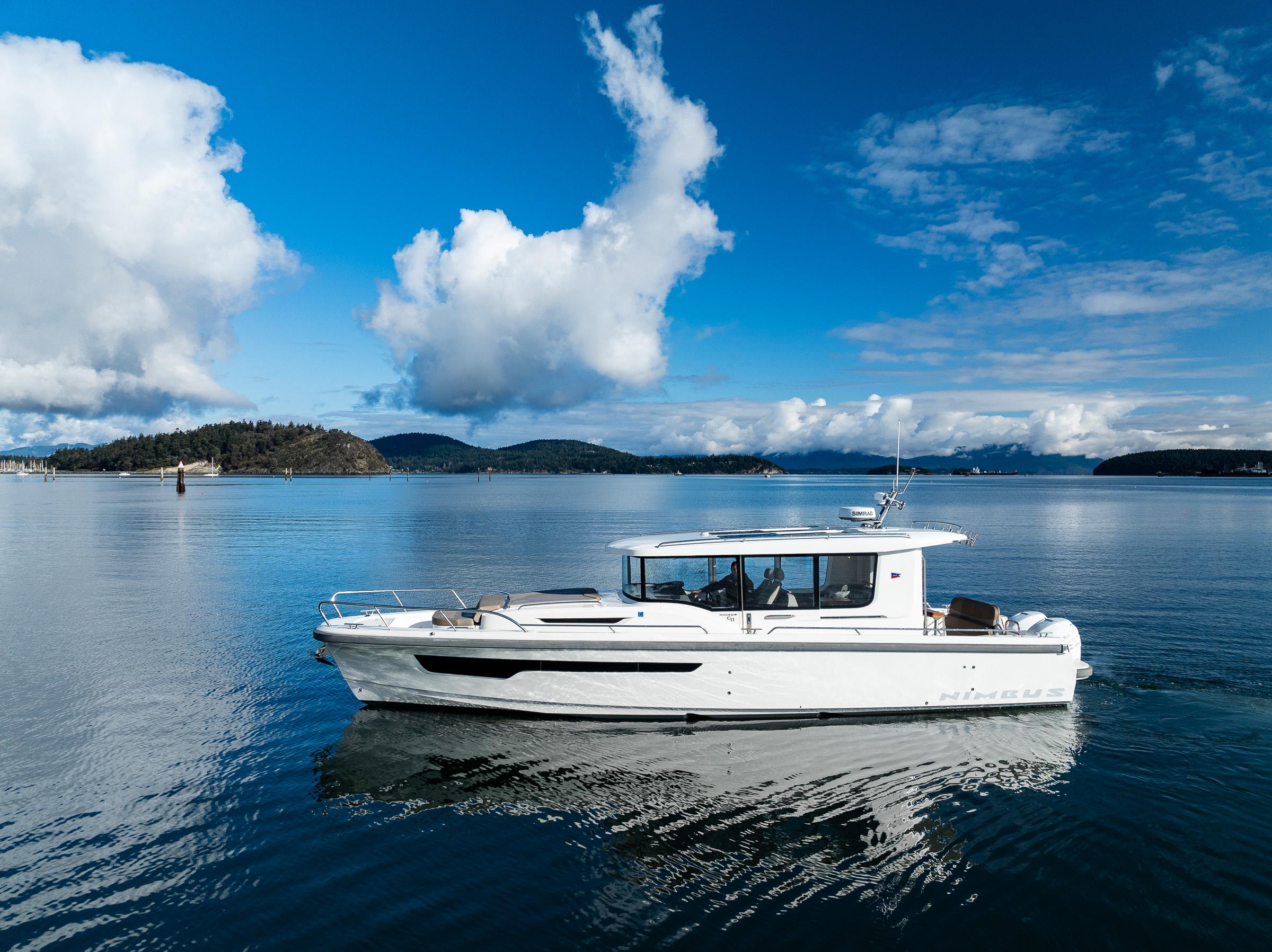 Nimbus-C11 2021-RYLEA ROSE WA-US-Nimbus C11 2021 boat cruising on a serene lake under a blue sky.-9586288 | Thumbnail