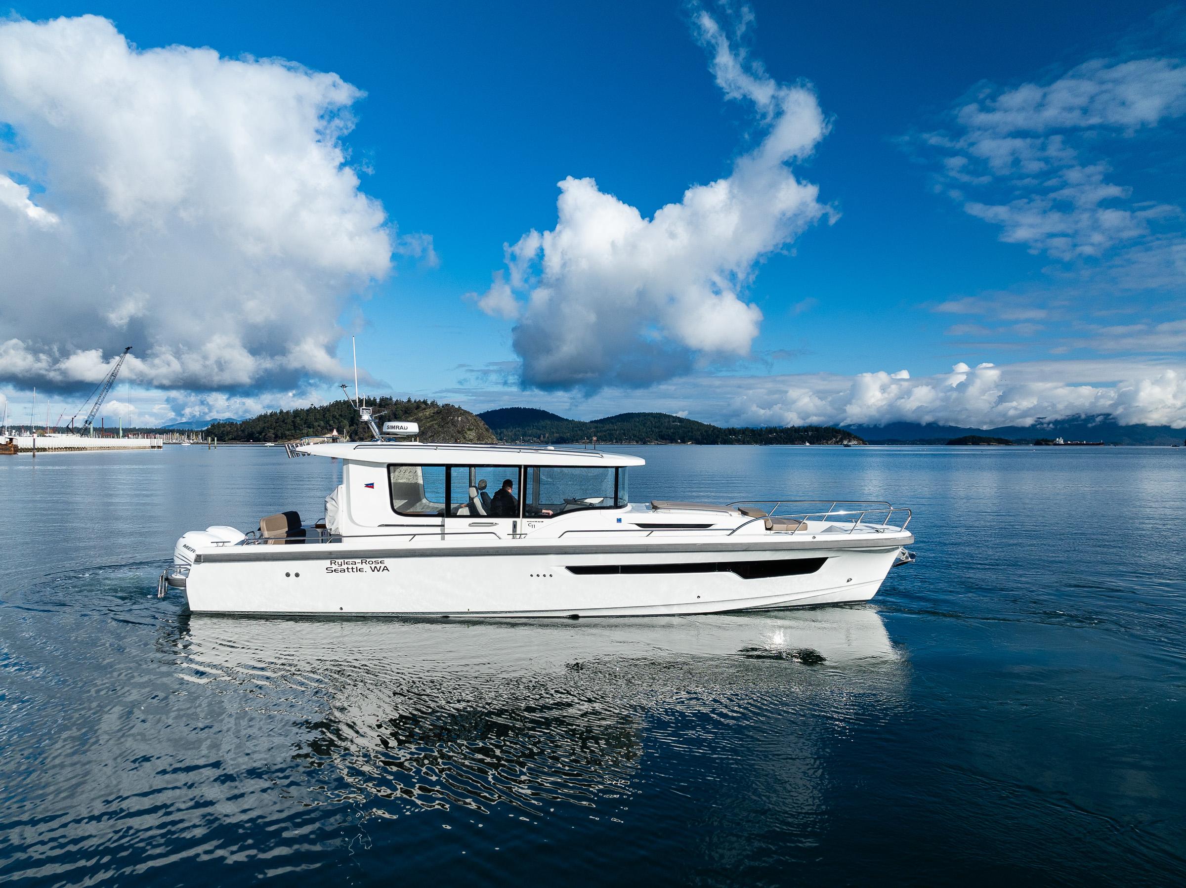 Nimbus-C11 2021-RYLEA ROSE WA-US-Nimbus C11 2021 boat cruising on a serene lake under a blue sky.-9586288 | Thumbnail