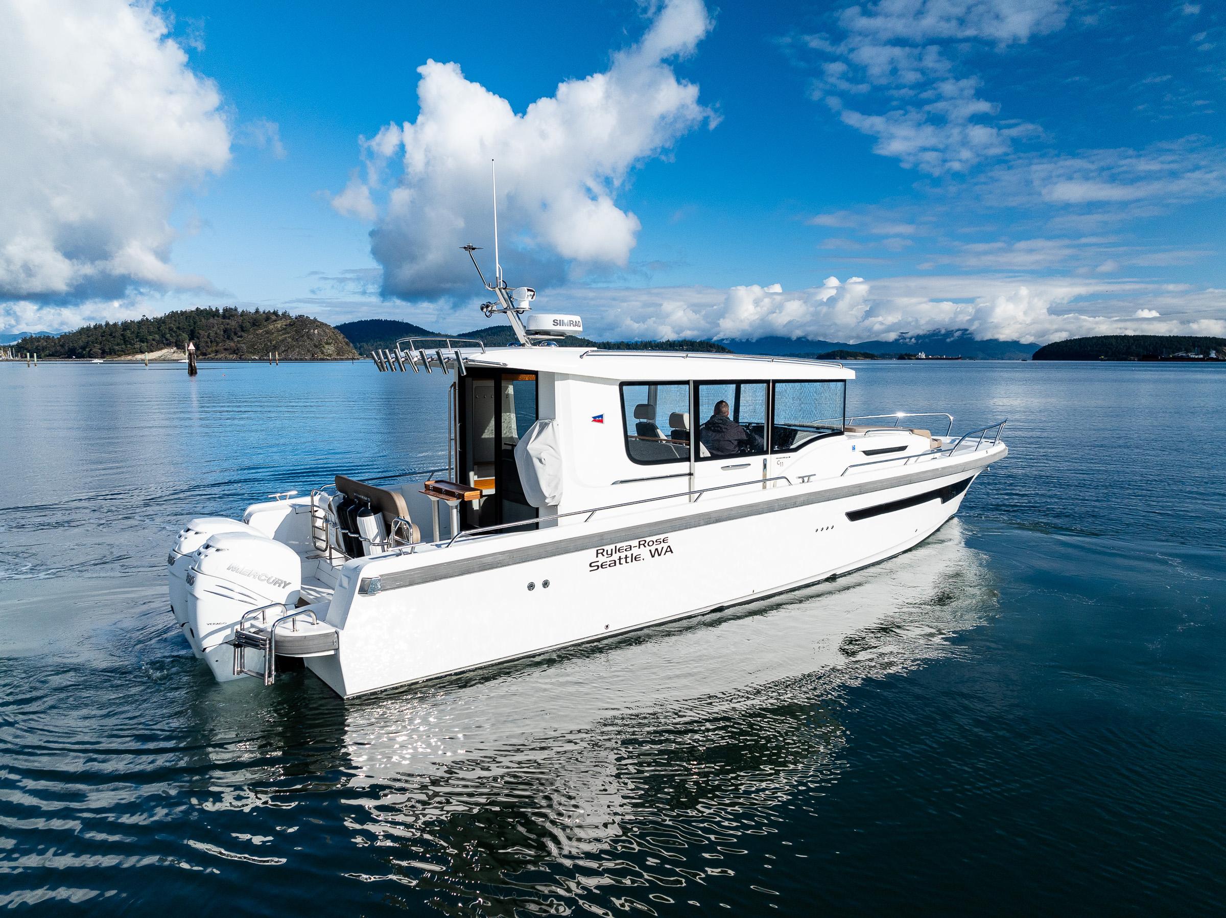 Nimbus-C11 2021-RYLEA ROSE WA-US-Nimbus C11 2021 boat cruising on a serene lake under a blue sky.-9586288 | Thumbnail