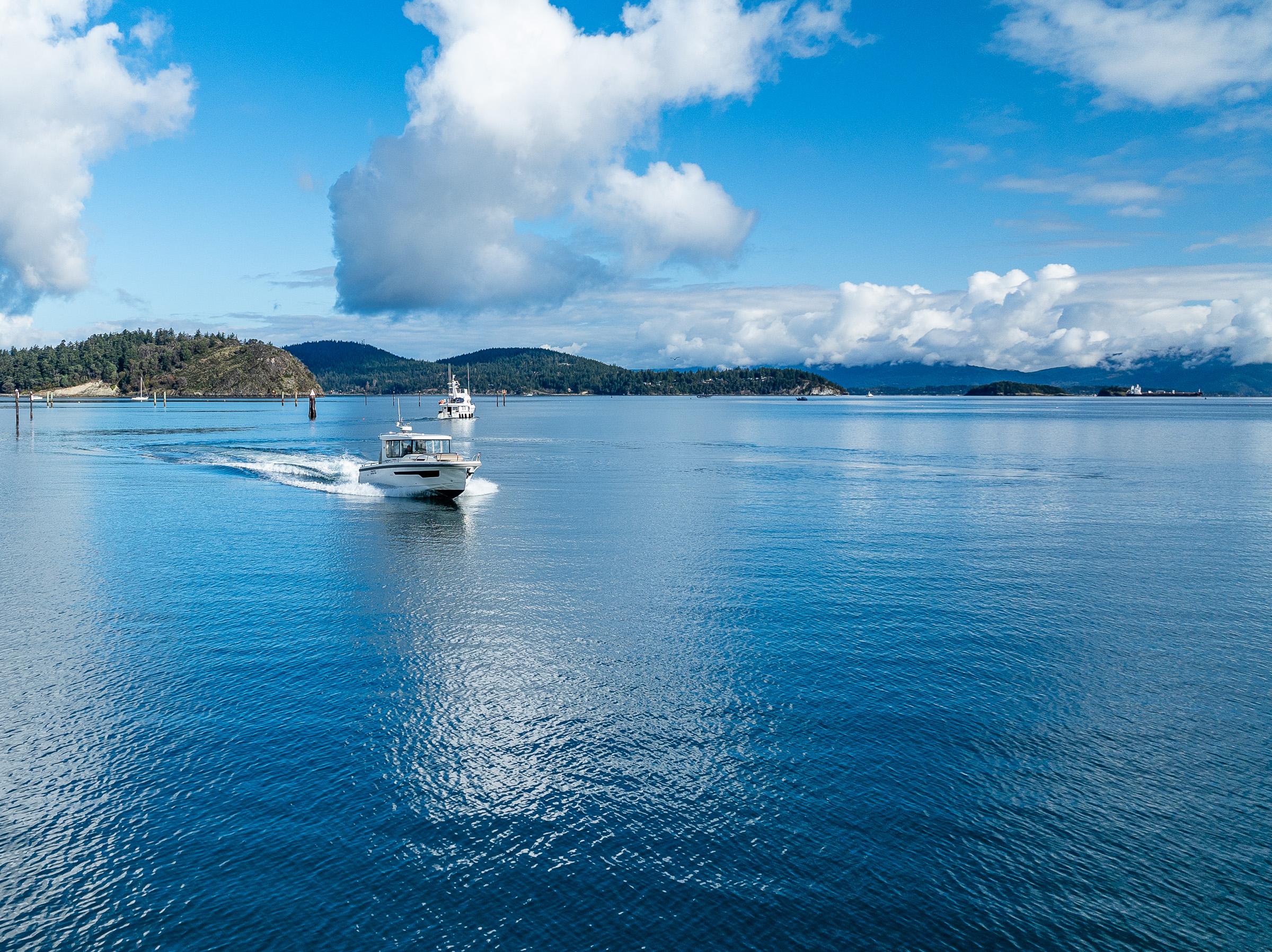 Nimbus-C11 2021-RYLEA ROSE WA-US-Nimbus C11 boat cruising on a serene blue lake under a partly cloudy sky.-9586288 | Thumbnail