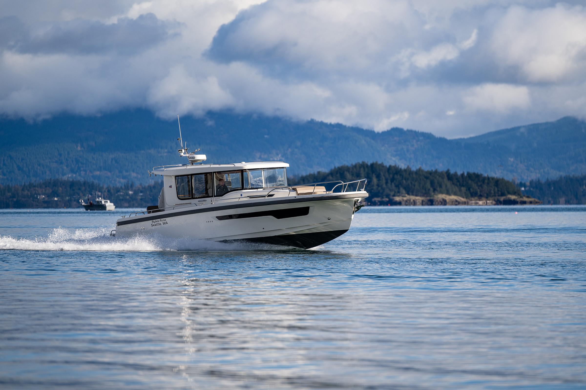 Nimbus-C11 2021-RYLEA ROSE WA-US-Nimbus C11 2021 boat cruising on a serene lake with mountainous backdrop.-9586288 | Thumbnail