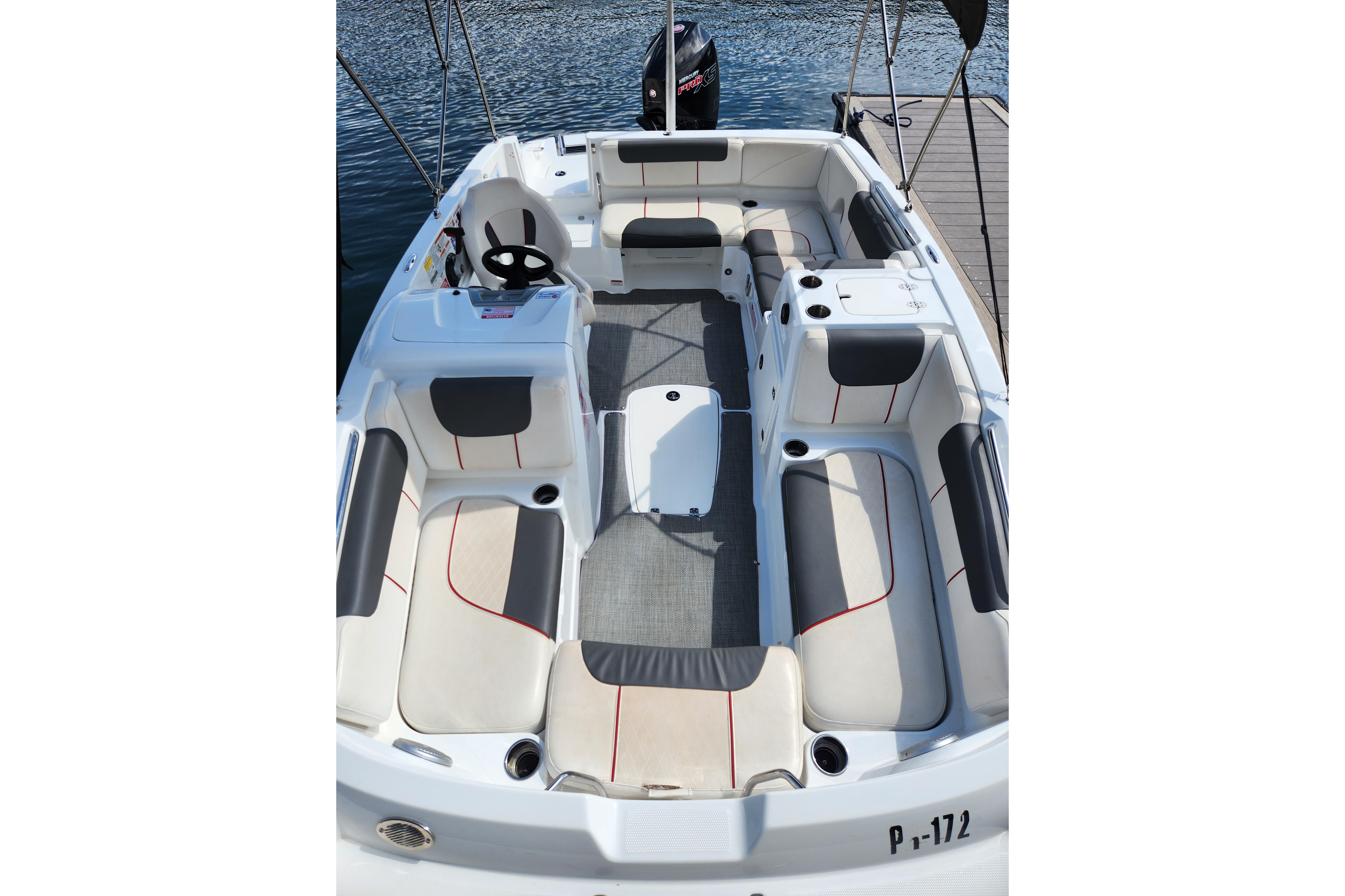 2021 Tahoe 1950 boat interior with spacious seating and modern design on the water.