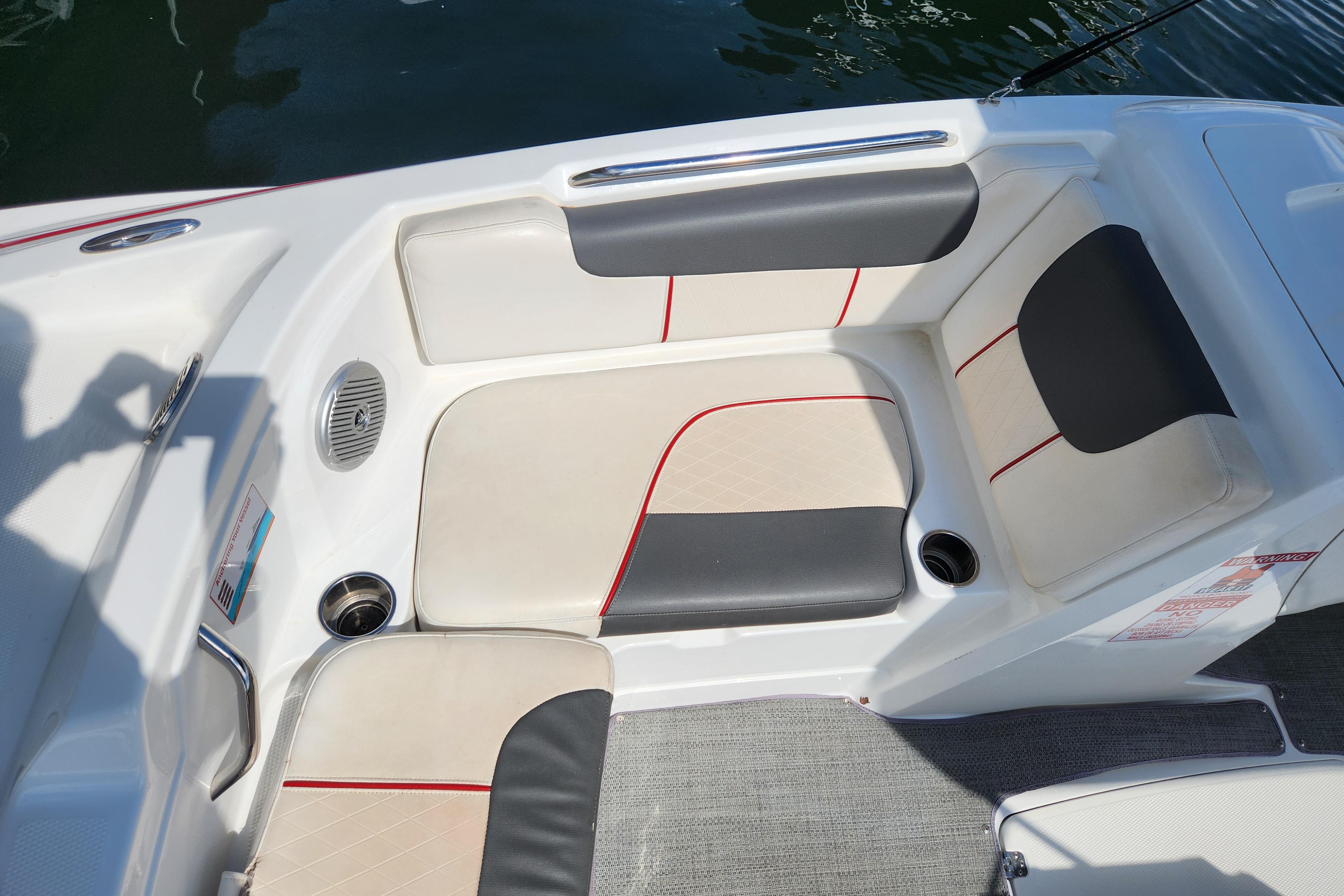 Interior seating of a 2021 Tahoe 1950 boat with gray and white upholstery.
