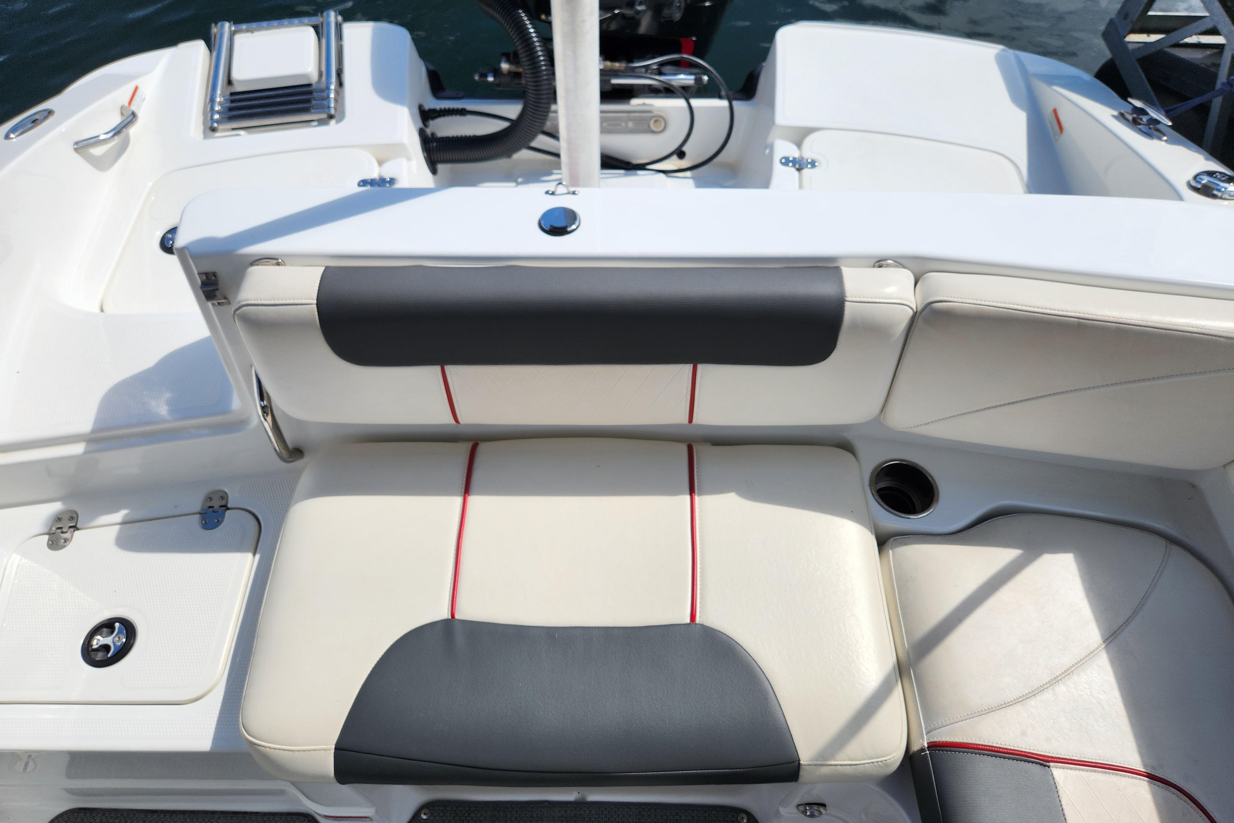 Interior of a 2021 Tahoe 1950 boat featuring white and gray seating.