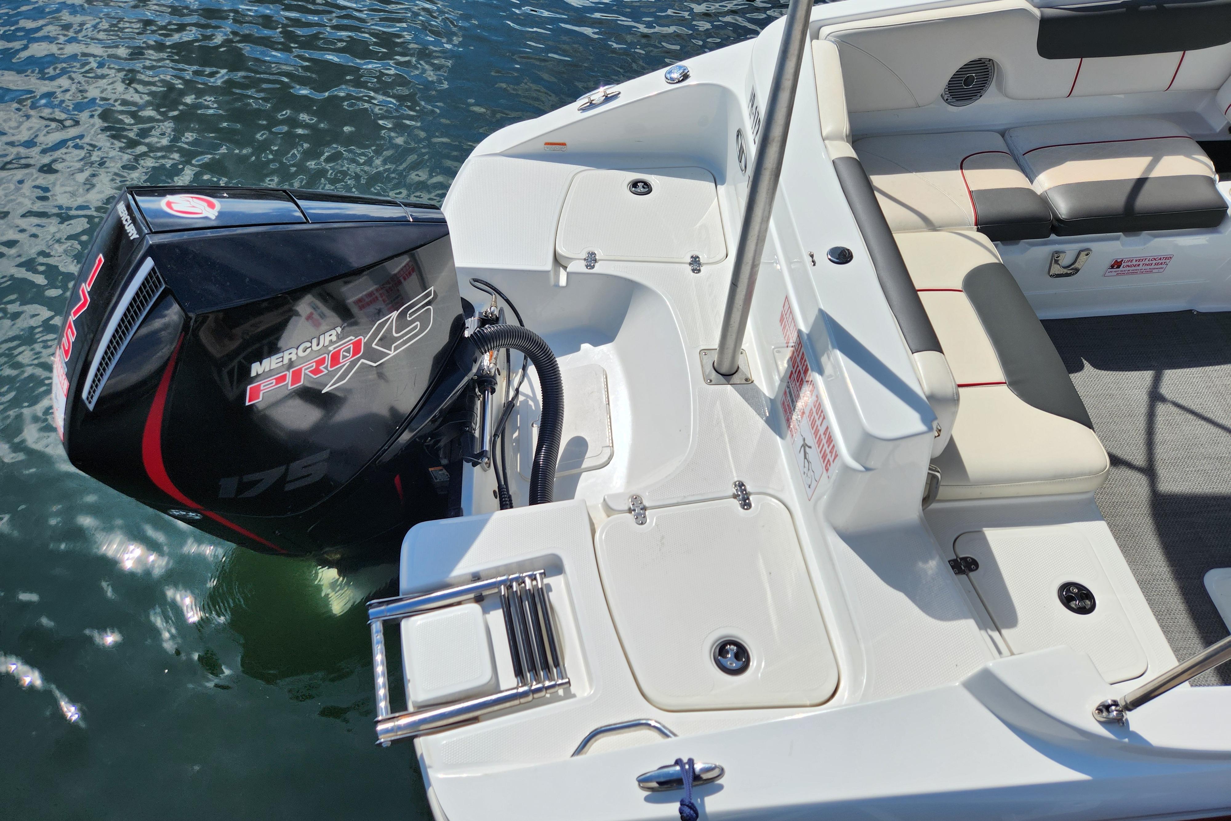 2021 Tahoe 1950 boat with Mercury Pro XS 175 engine on water.