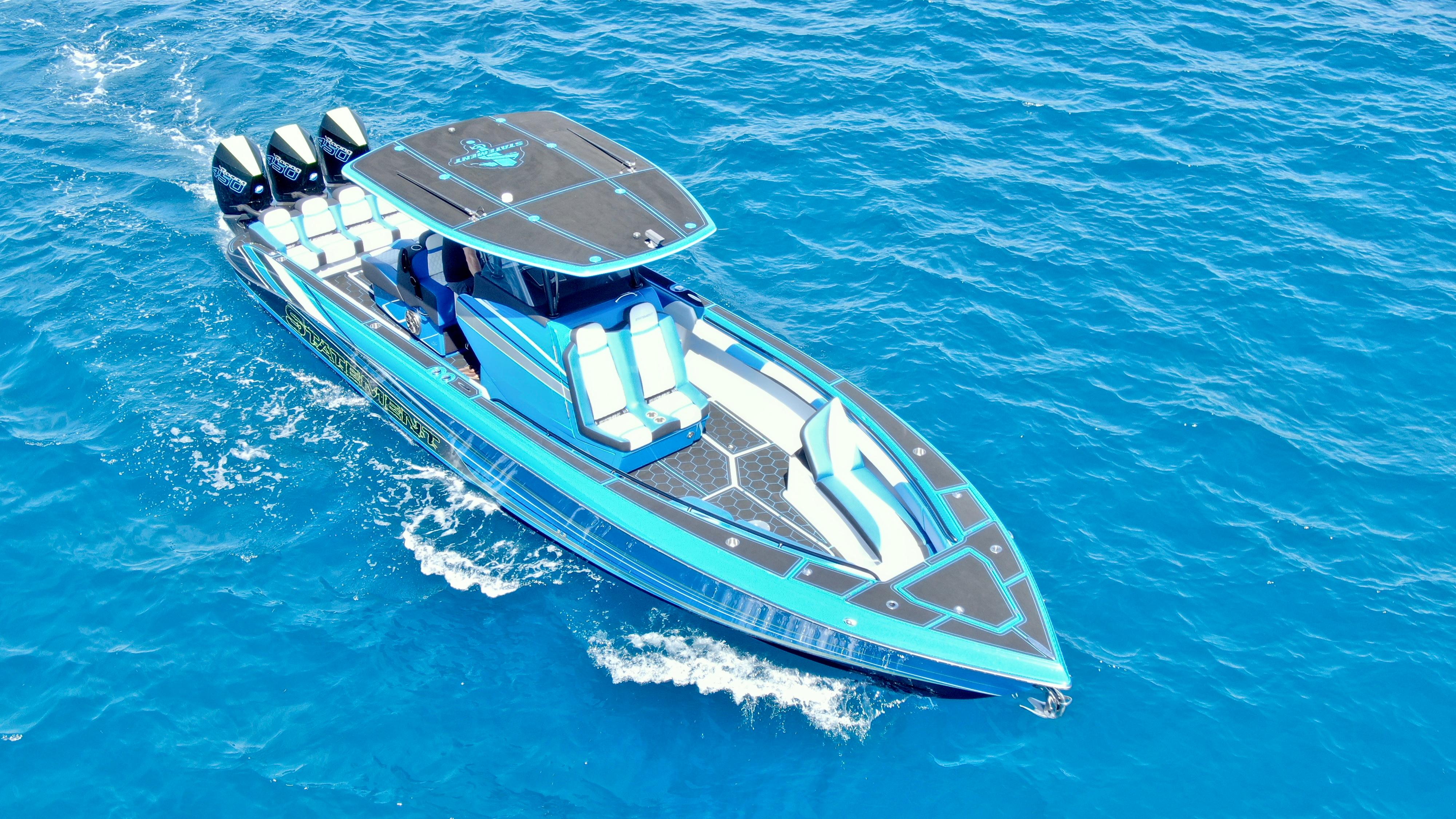Statement-380 Open 2022-Riptide FL-US-2023 Statement 380 Open boat cruising on clear blue water.-9716318 | Thumbnail