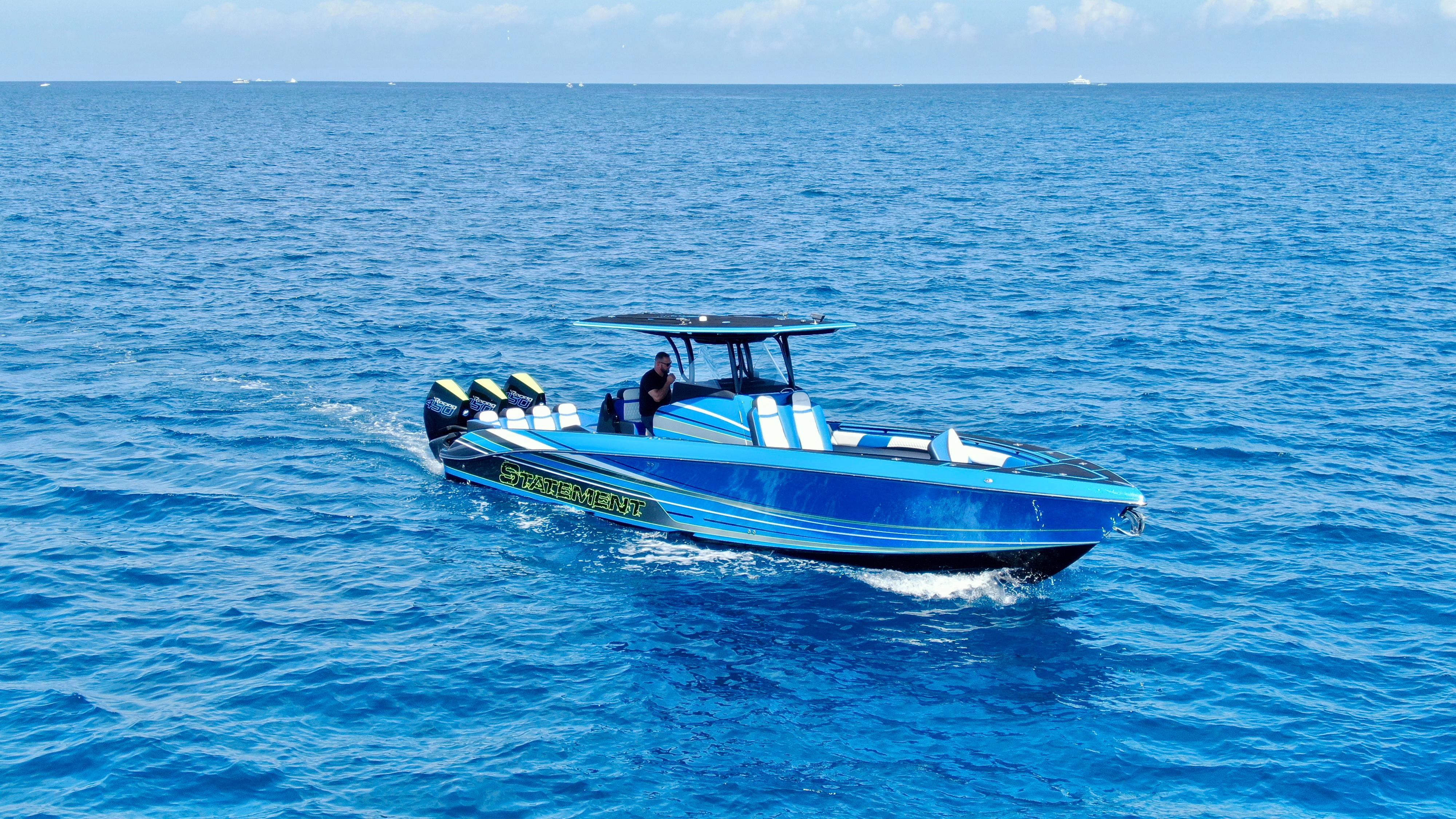 Statement-380 Open 2022-Riptide FL-US-2023 Statement 380 Open boat cruising on clear blue ocean waters.-9716318 | Thumbnail