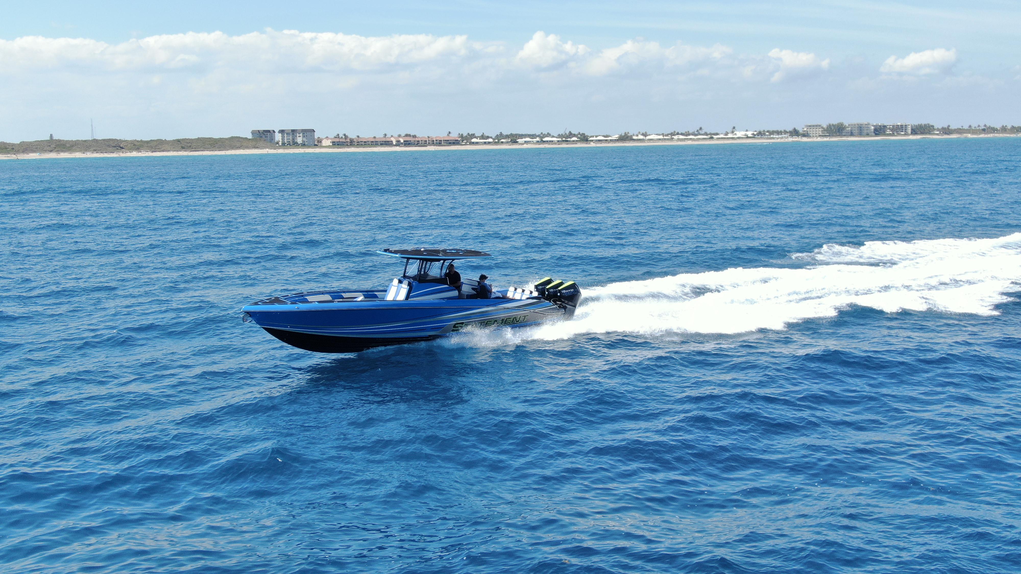 Statement-380 Open 2022-Riptide FL-US-2023 Statement 380 Open boat cruising on open sea, clear blue water, sunny day.-9716318 | Thumbnail