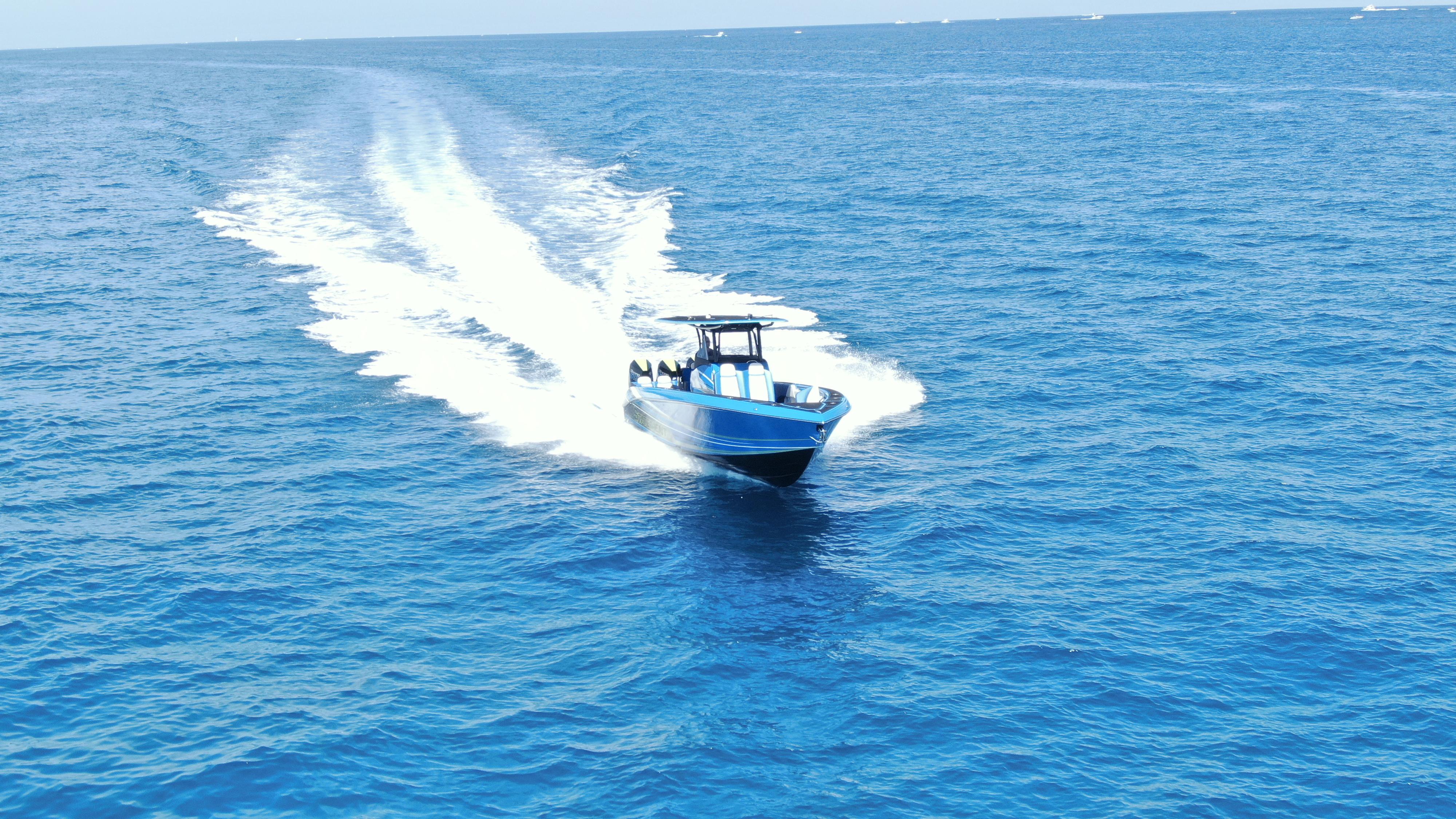 Statement-380 Open 2022-Riptide FL-US-2023 Statement 380 Open boat cruising on open blue ocean waters.-9716318 | Thumbnail
