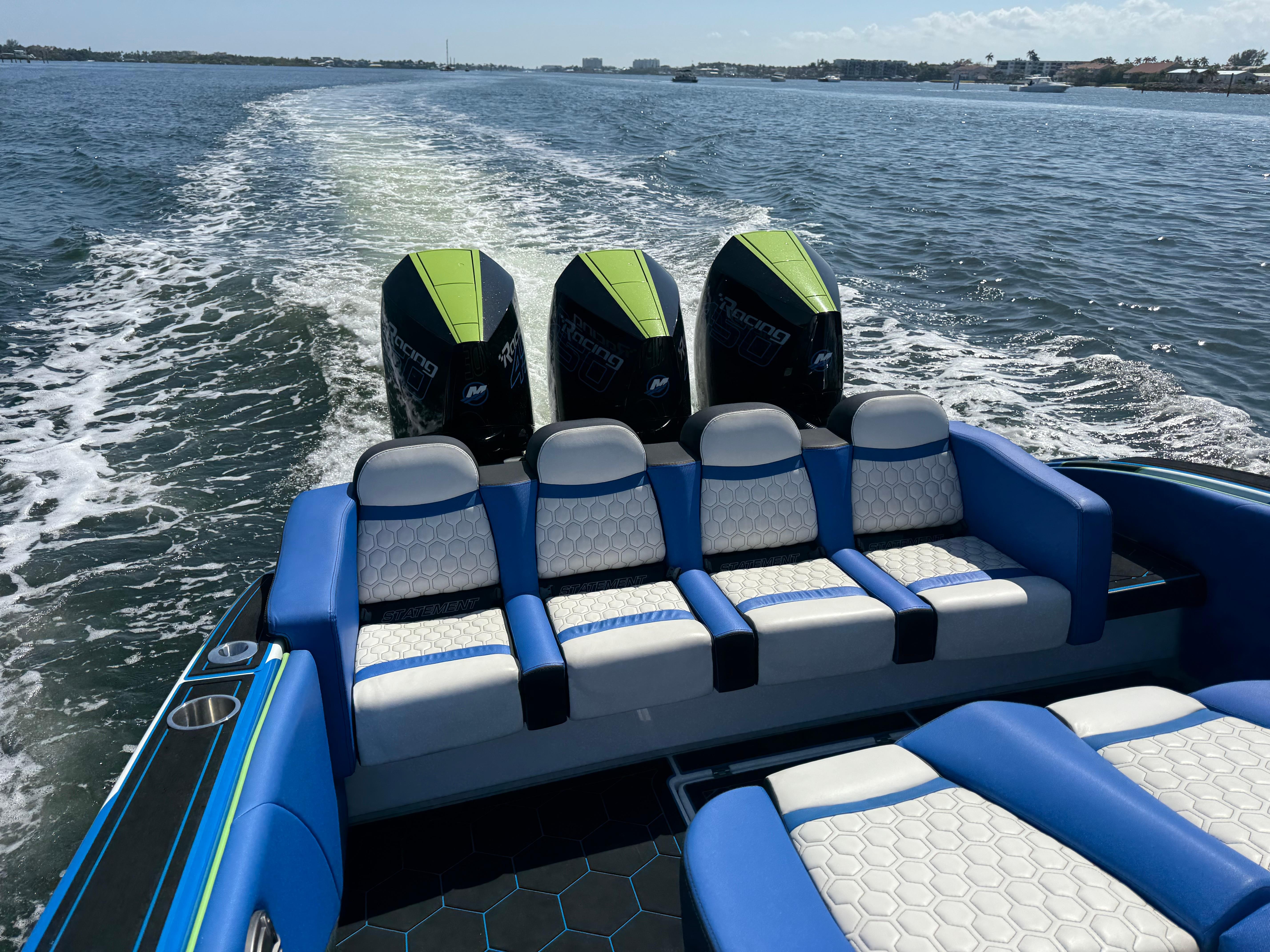 Statement-380 Open 2022-Riptide FL-US-2023 Statement 380 Open boat with triple engines cruising on open water.-9716318 | Thumbnail