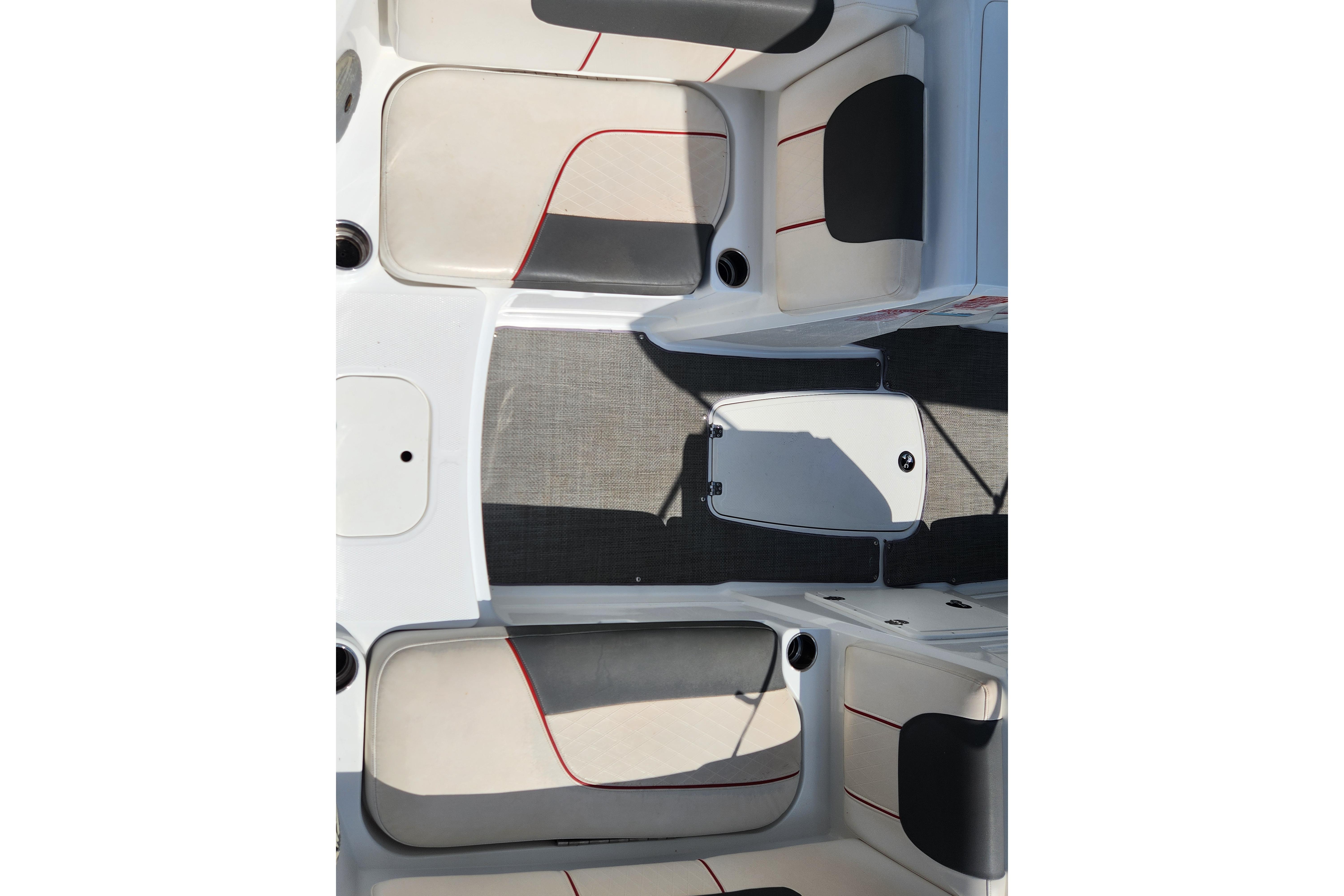 Interior of a 2021 Tahoe 1950 boat with beige and black seating.