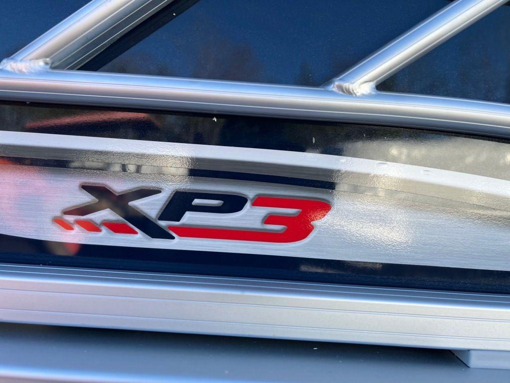 2023 Sun Tracker FISHIN' BARGE® 22 XP3 logo on boat exterior.