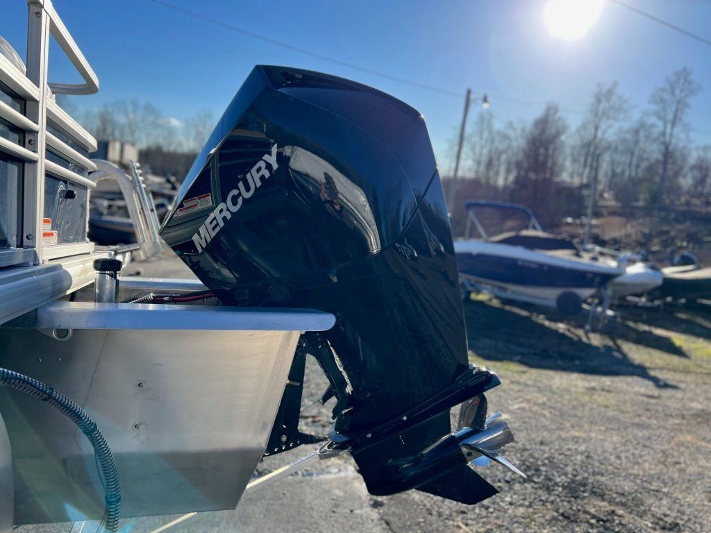 2023 Sun Tracker FISHIN' BARGE® 22 XP3 with Mercury outboard motor.