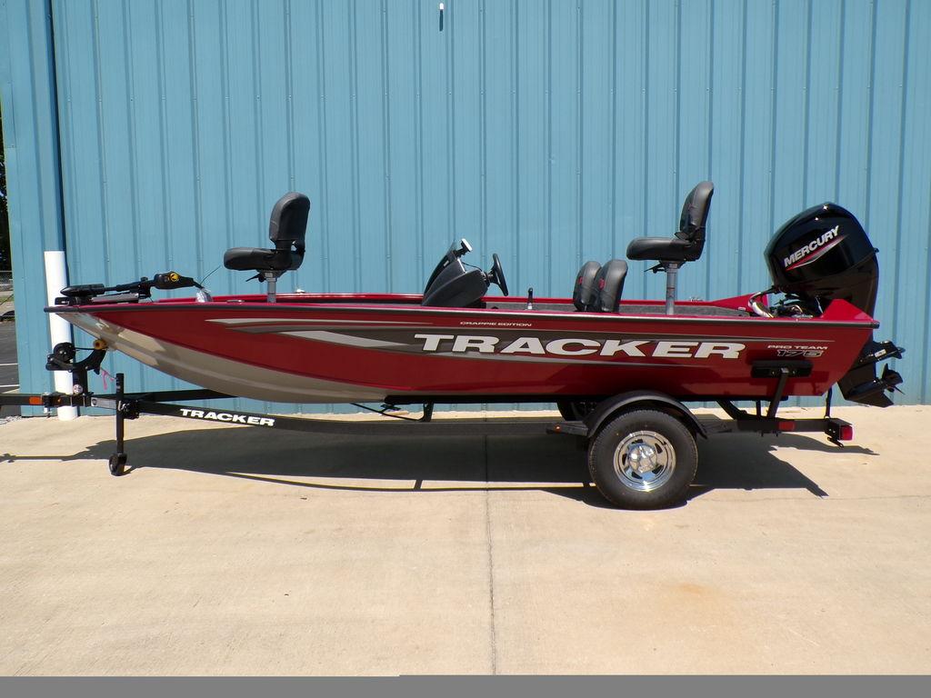 2025 Tracker Pro Team 175 TF® boat, red, on trailer, side view.