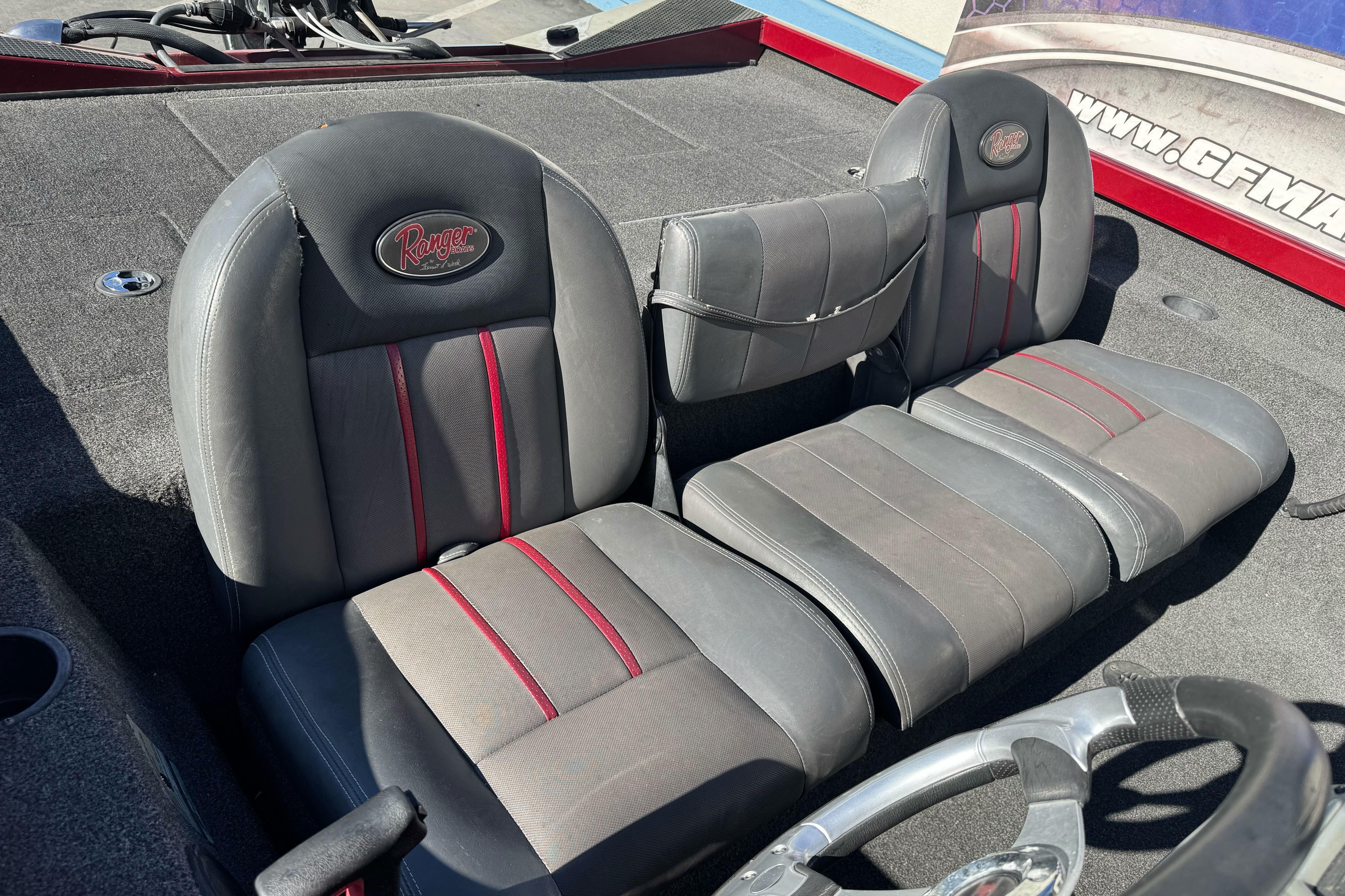 2016 Ranger RT178 boat seats with red accents and steering wheel.