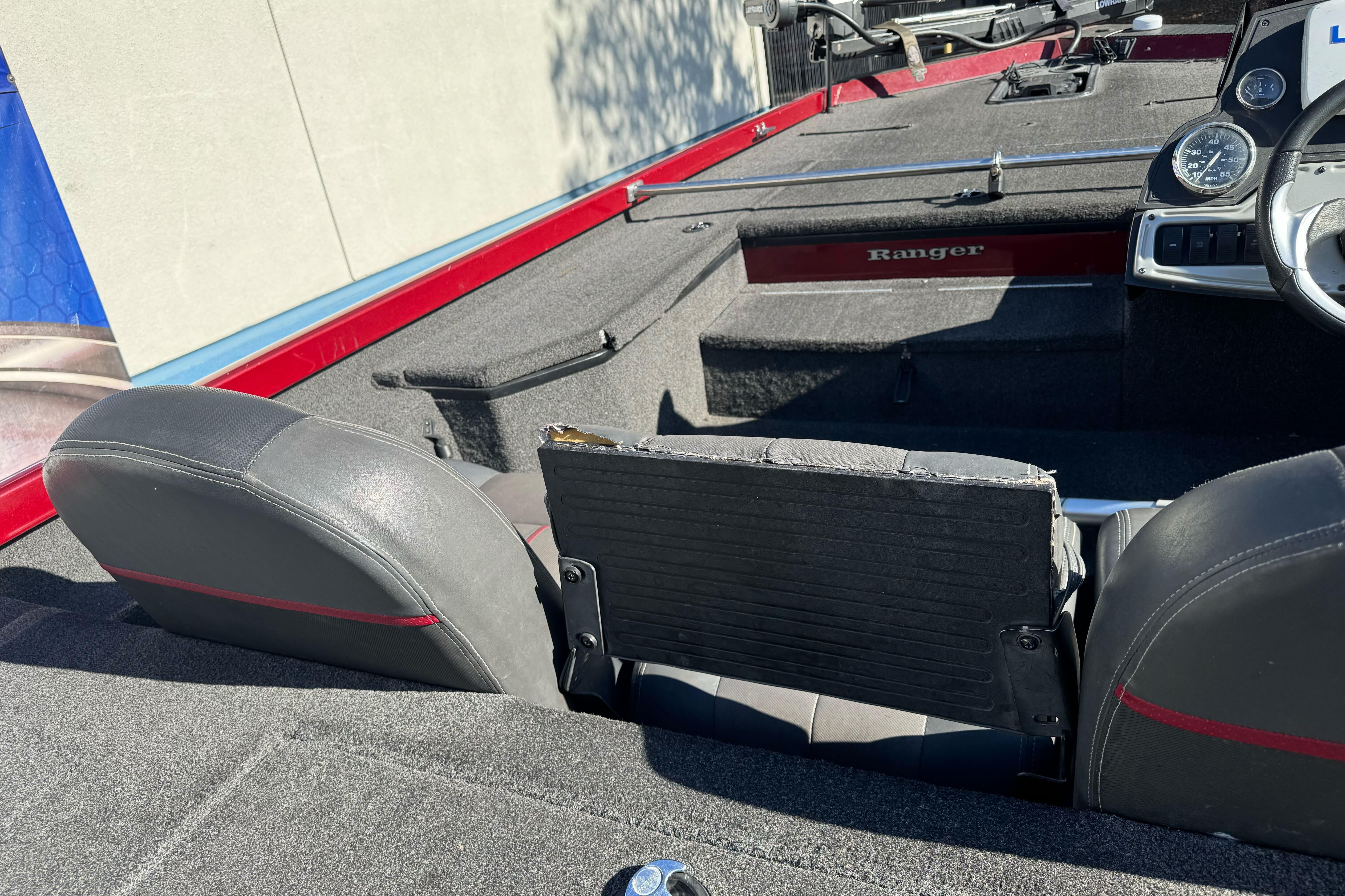 2016 Ranger RT178 boat interior with seating and dashboard, featuring red and black accents.