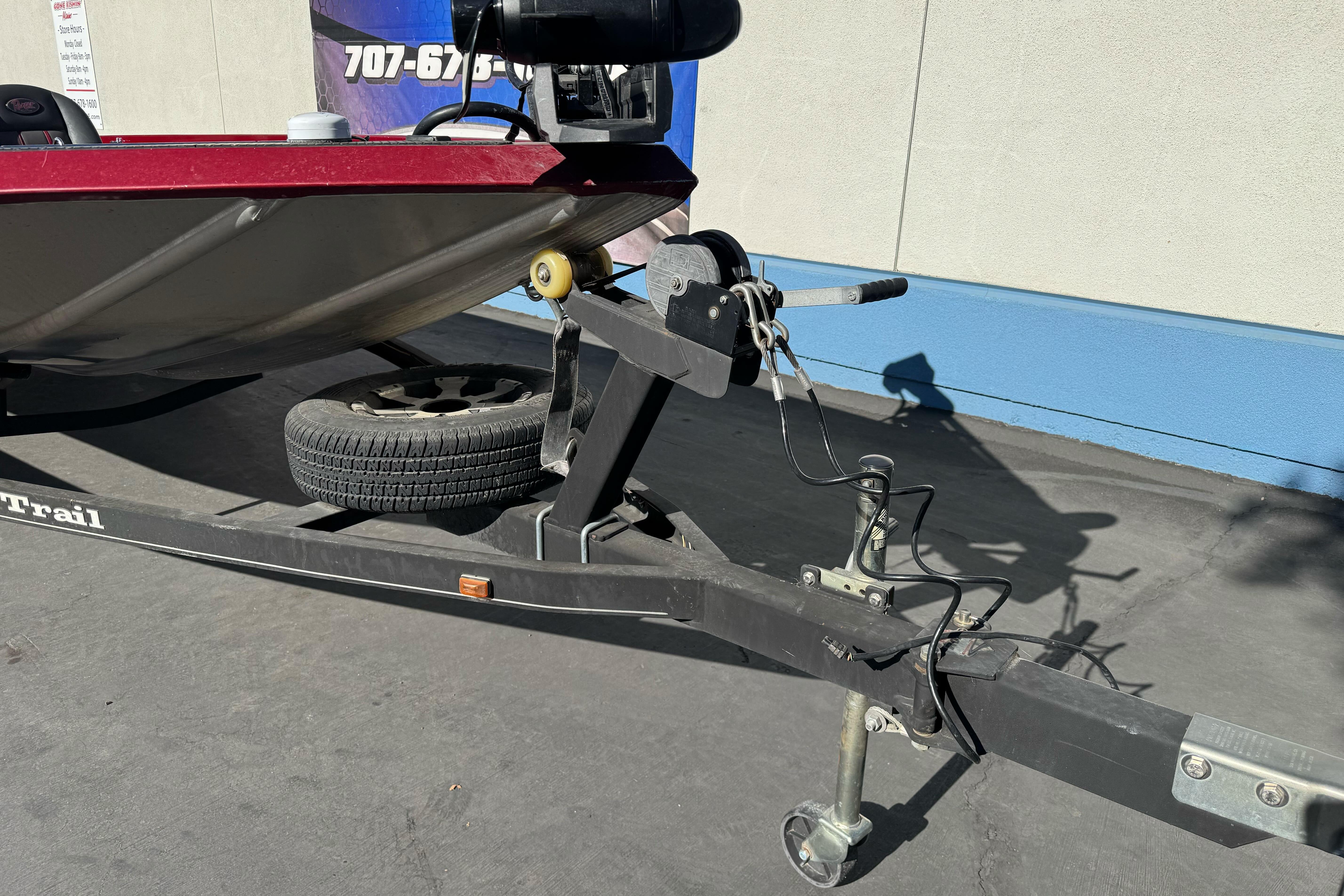 2016 Ranger RT178 boat trailer with winch and spare tire on pavement.