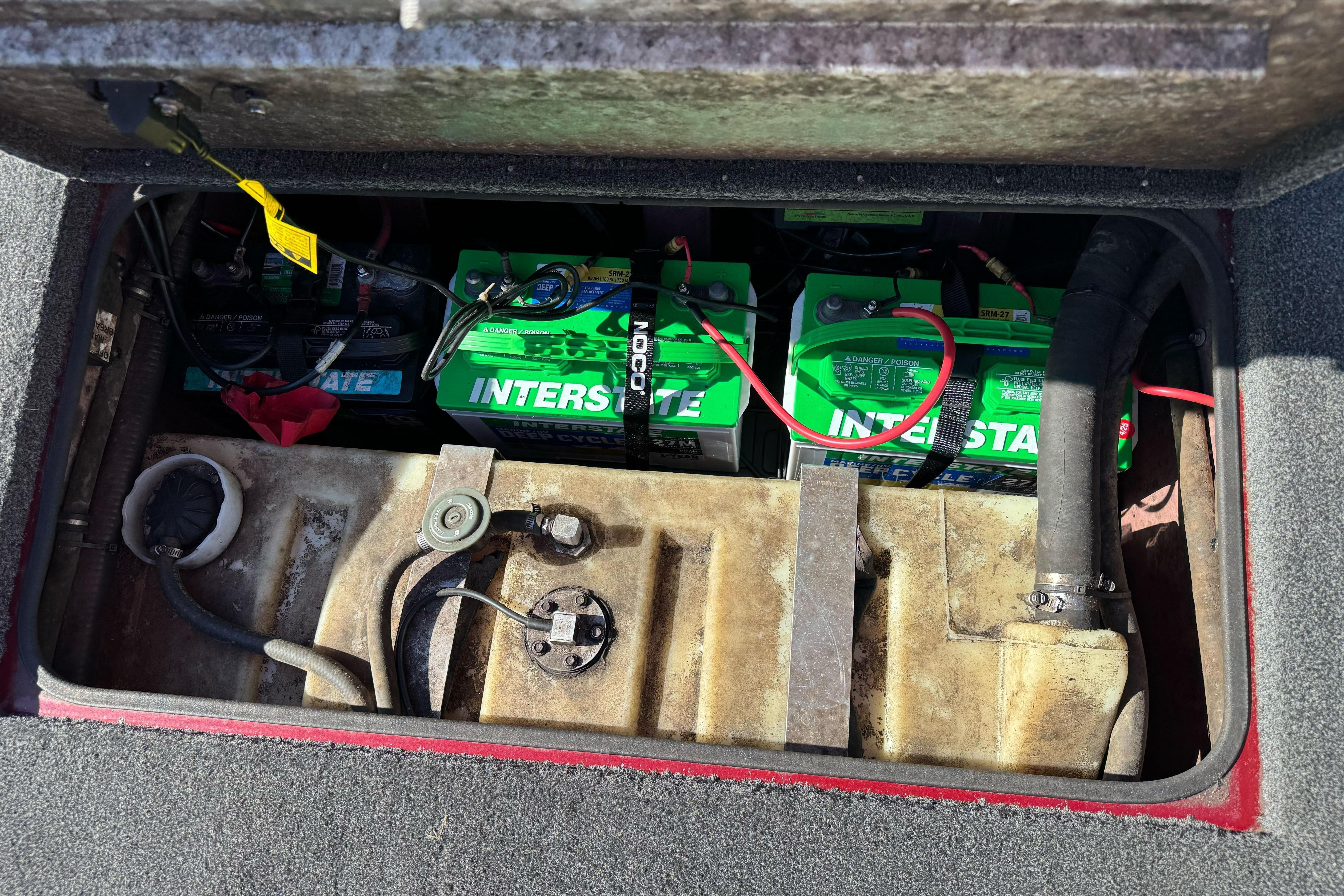 Battery compartment of a 2016 Ranger RT178 boat with Interstate batteries.