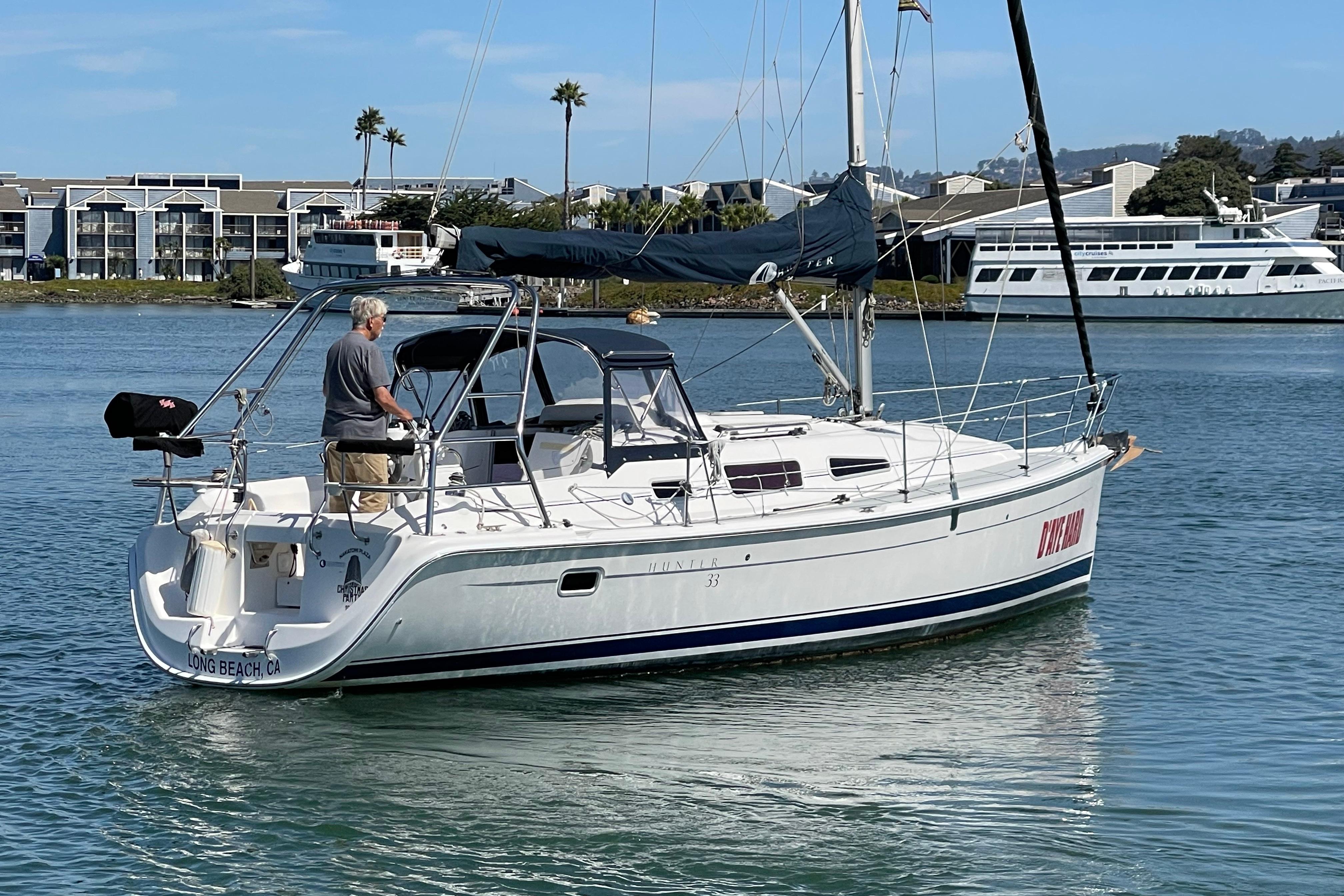 2004 Hunter 33-2 sailboat on calm water near Long Beach, California.