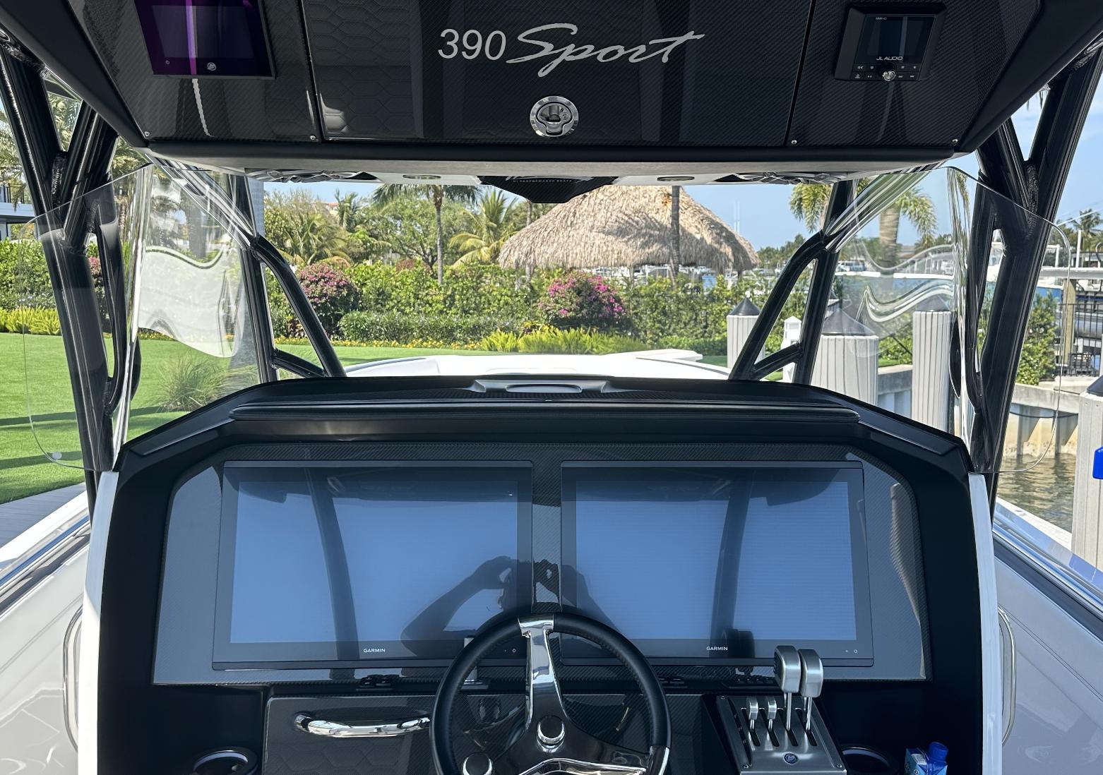 Nor-Tech-390 Sport Center Console 2023 -KY-US-2023 Nor-Tech 390 Sport Center Console dashboard with dual screens and steering wheel.-9746423 | Thumbnail