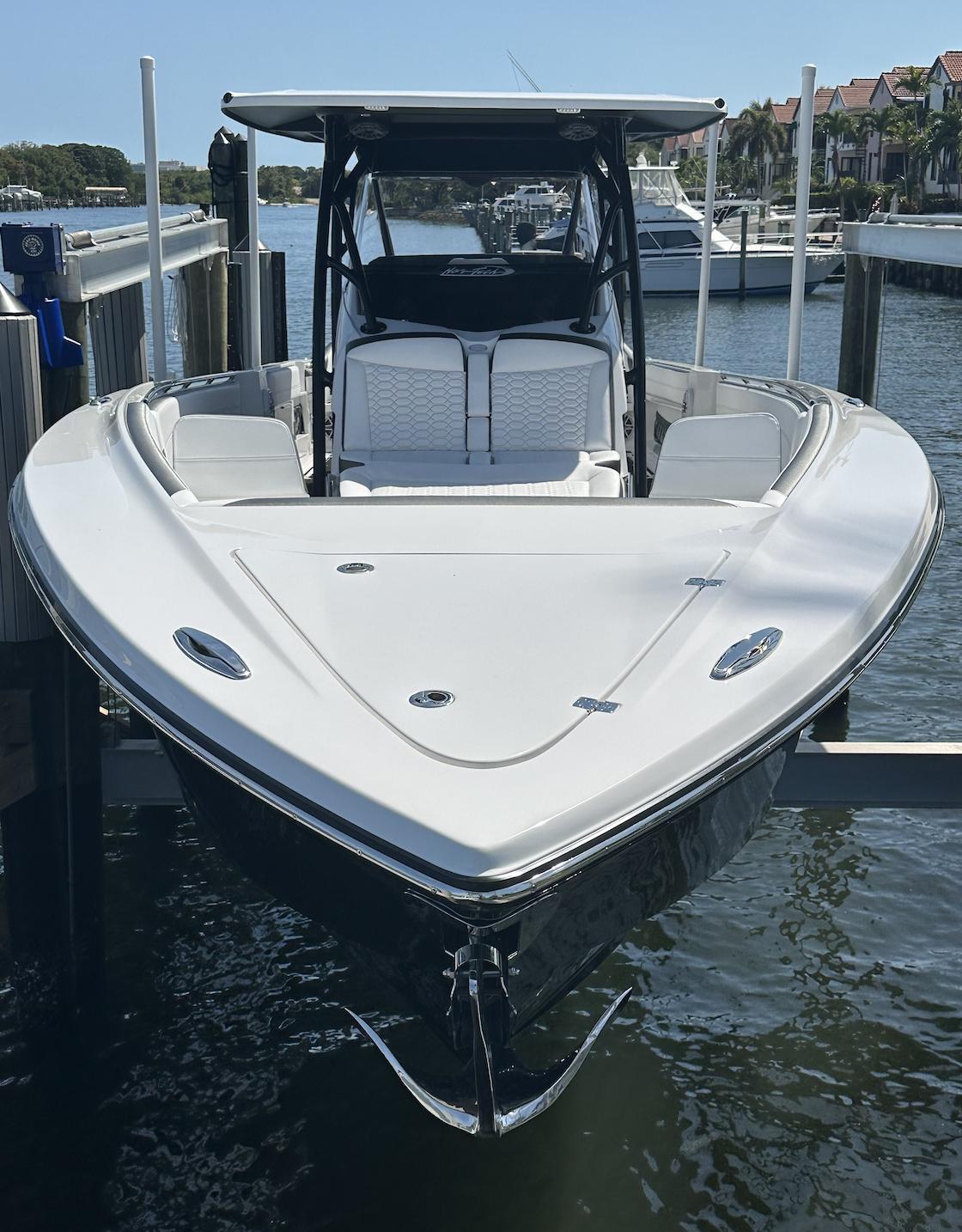 Nor-Tech-390 Sport Center Console 2023 -KY-US-2023 Nor-Tech 390 Sport Center Console boat docked in marina, front view.-9746423 | Thumbnail