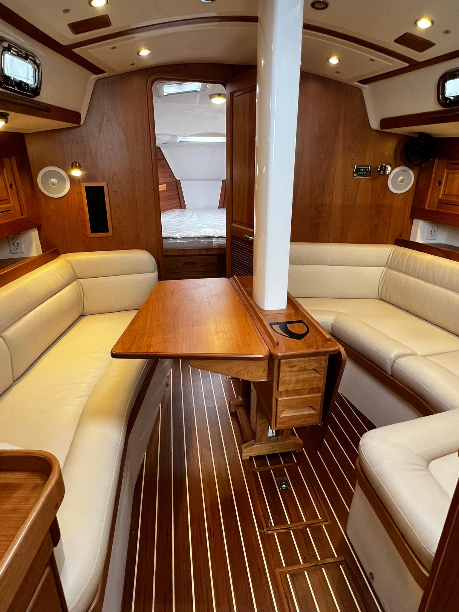 Tartan-395 2025-395 RI-US-Luxurious interior of 2025 Tartan 395 yacht with elegant wood finish and plush seating.-9826454 | Thumbnail