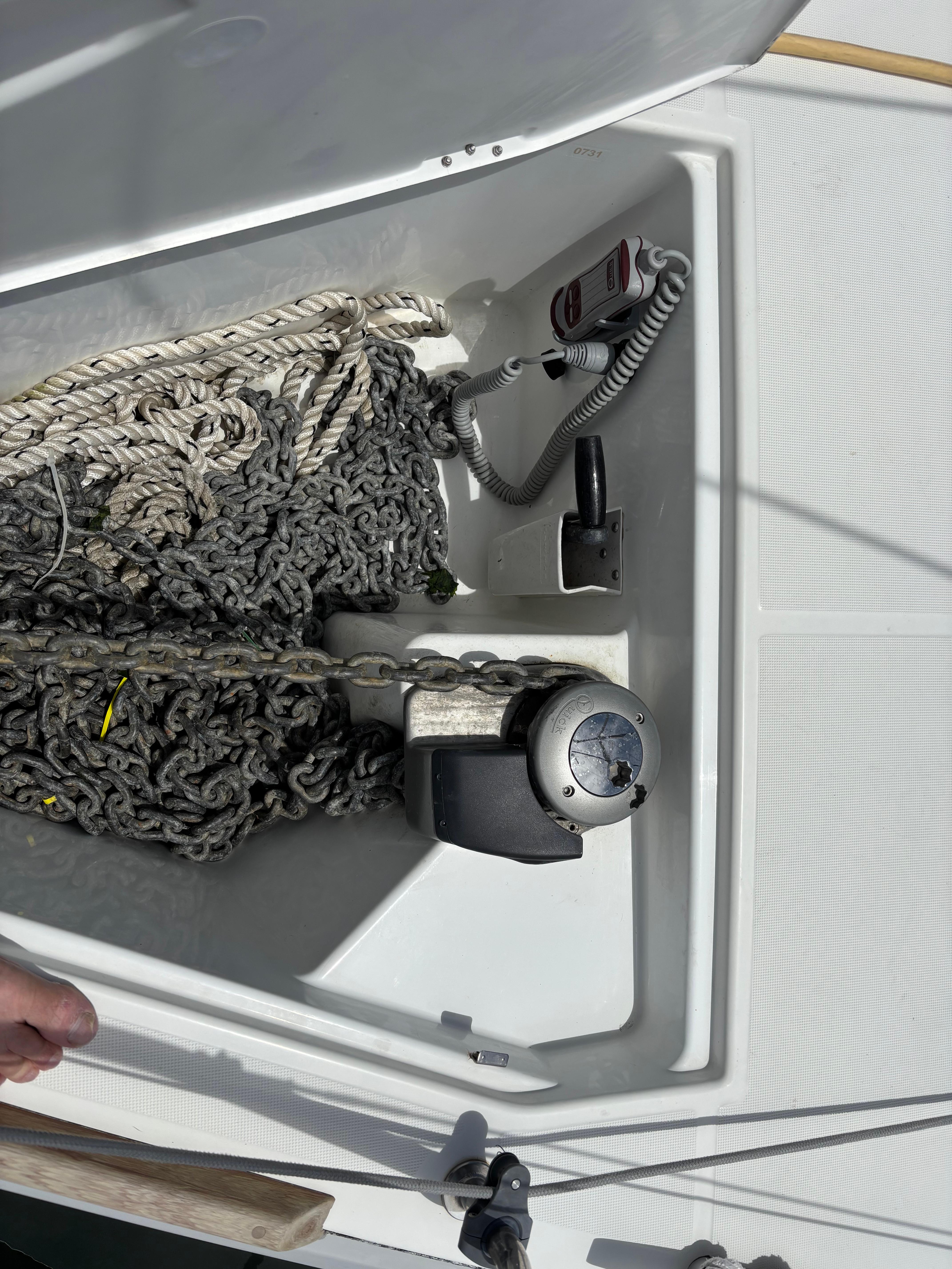 Anchor locker of 2021 Jeanneau Sun Odyssey 349 with chain and rope.