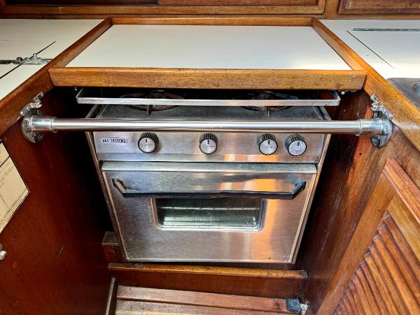 Stainless steel oven in 1979 Islander IP Peterson 40 yacht kitchen.