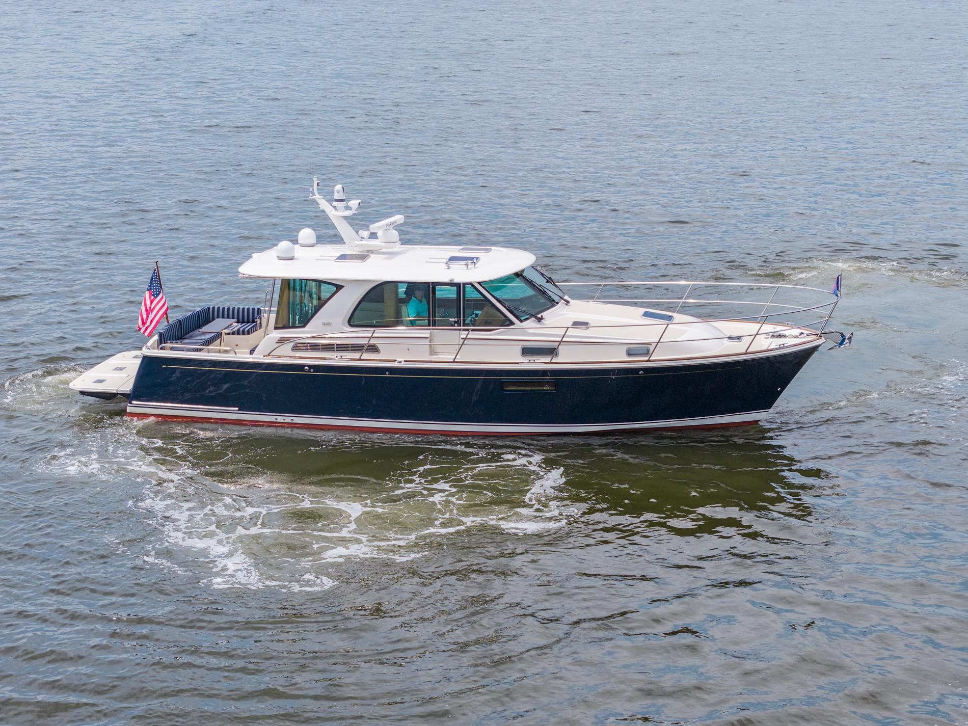 2024 Sabre 43 Salon Express yacht cruising on open water.
