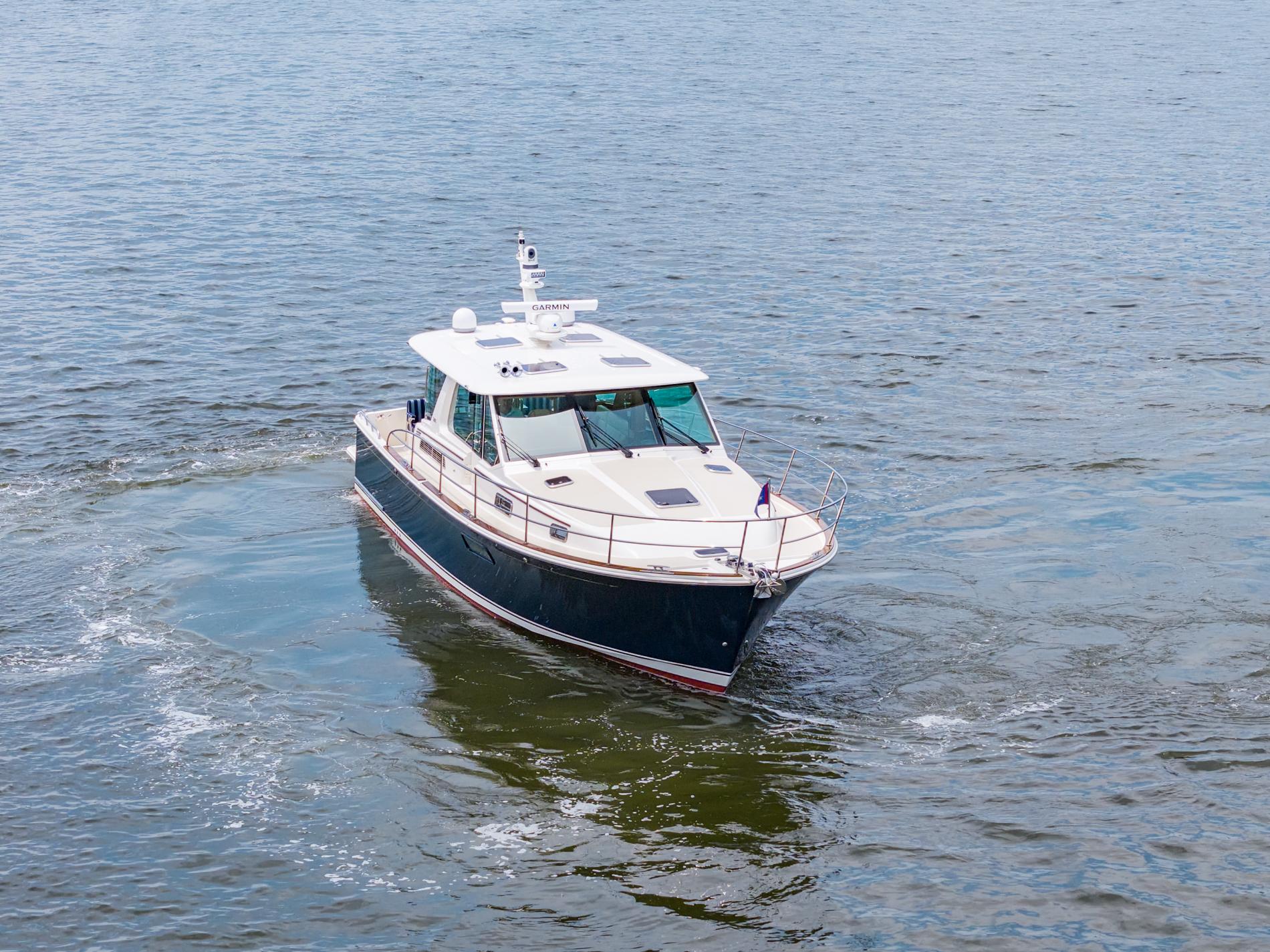 2024 Sabre 43 Salon Express yacht cruising on open water.