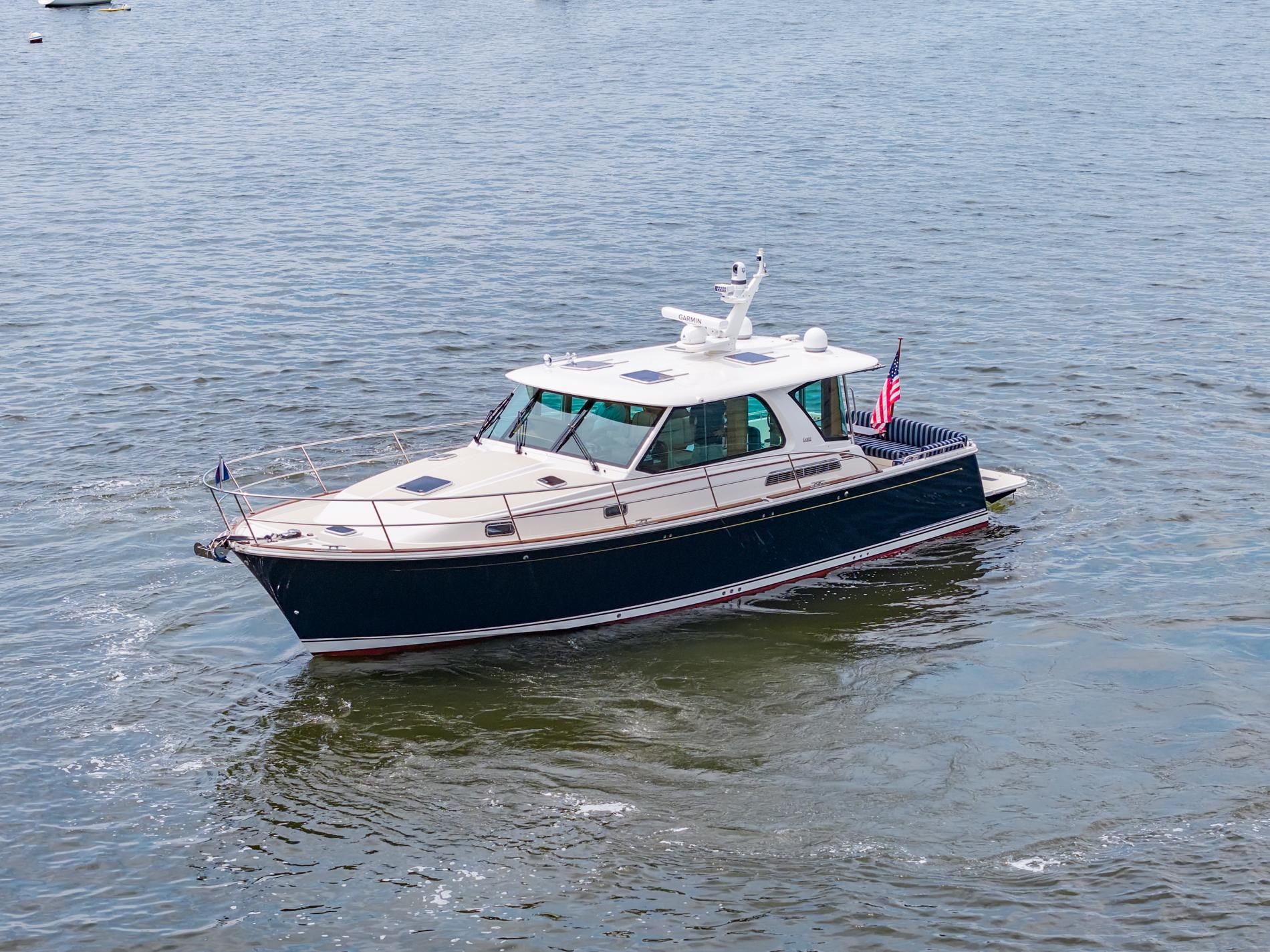 2024 Sabre 43 Salon Express yacht cruising on open water.