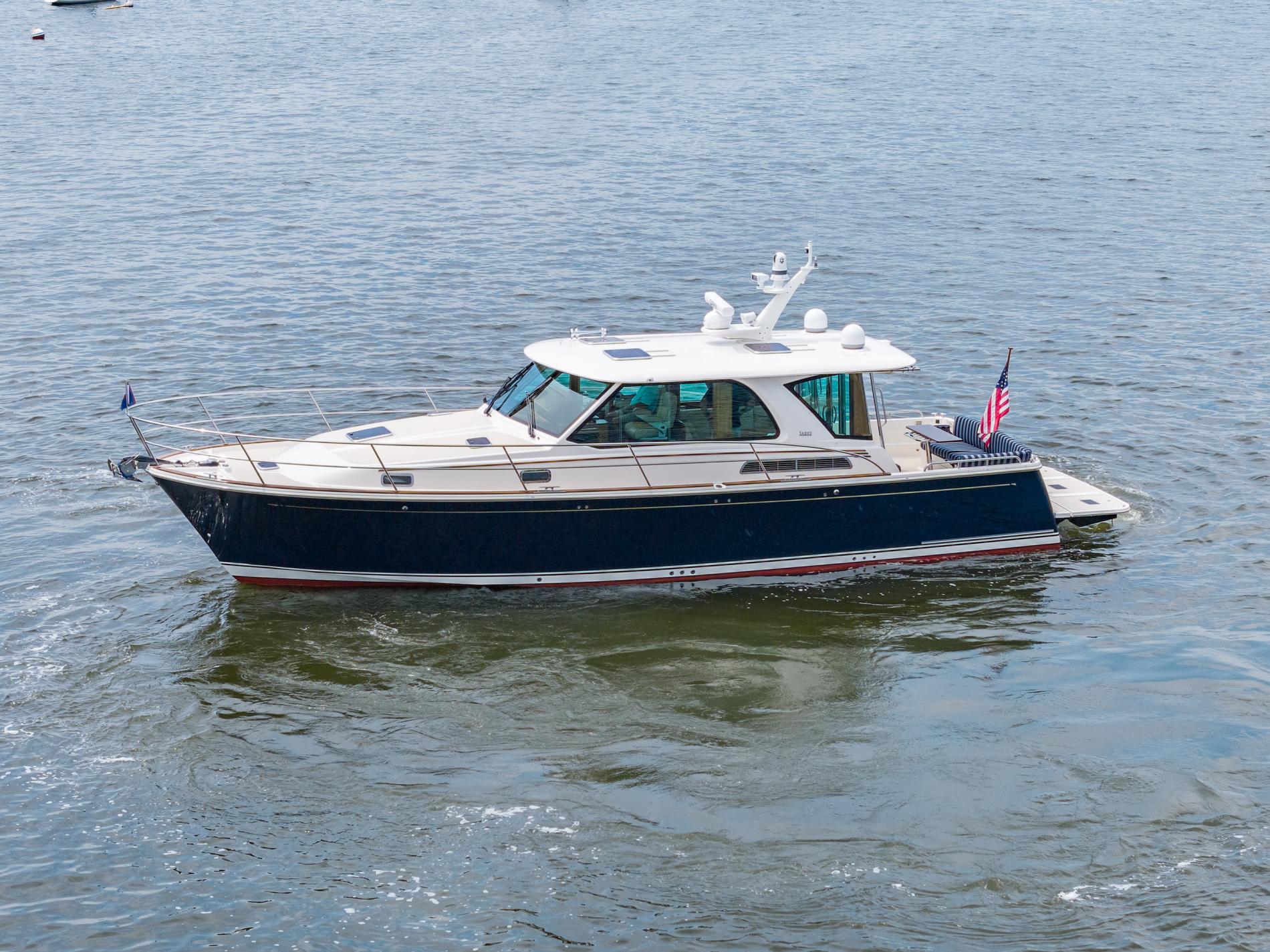 2024 Sabre 43 Salon Express yacht cruising on open water.