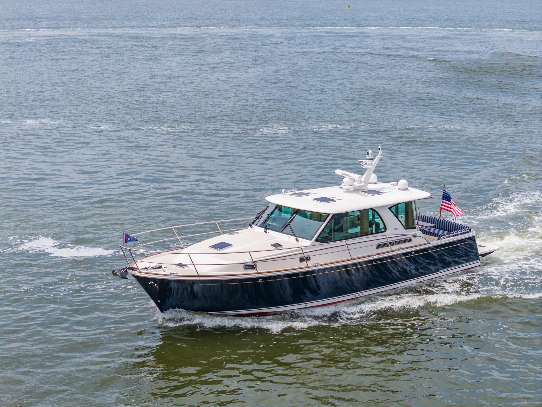 2024 Sabre 43 Salon Express yacht cruising on open water.