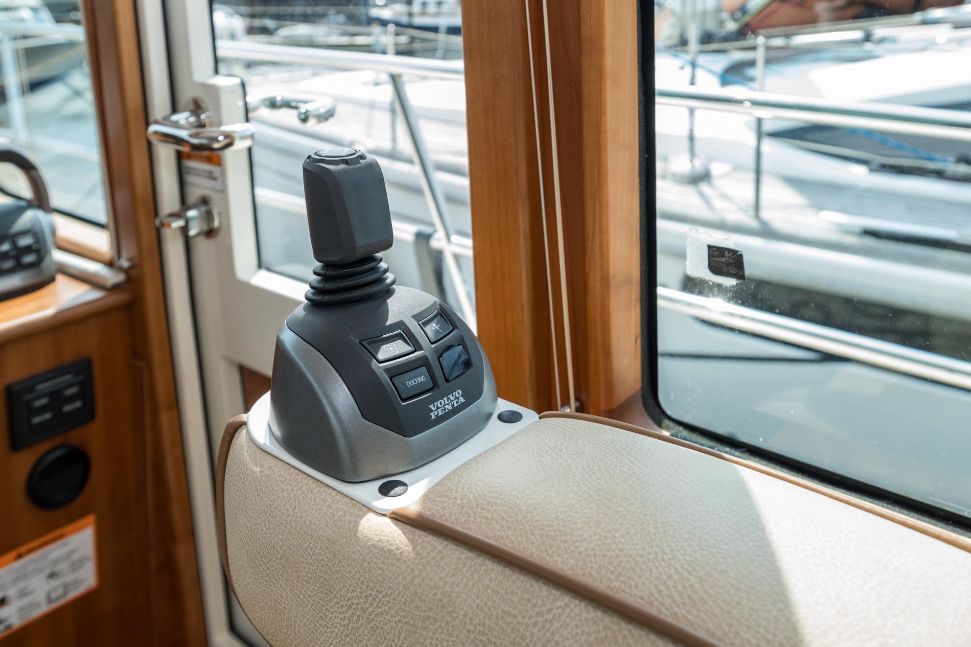 2024 Sabre 43 Salon Express interior joystick control, featuring Volvo Penta system.