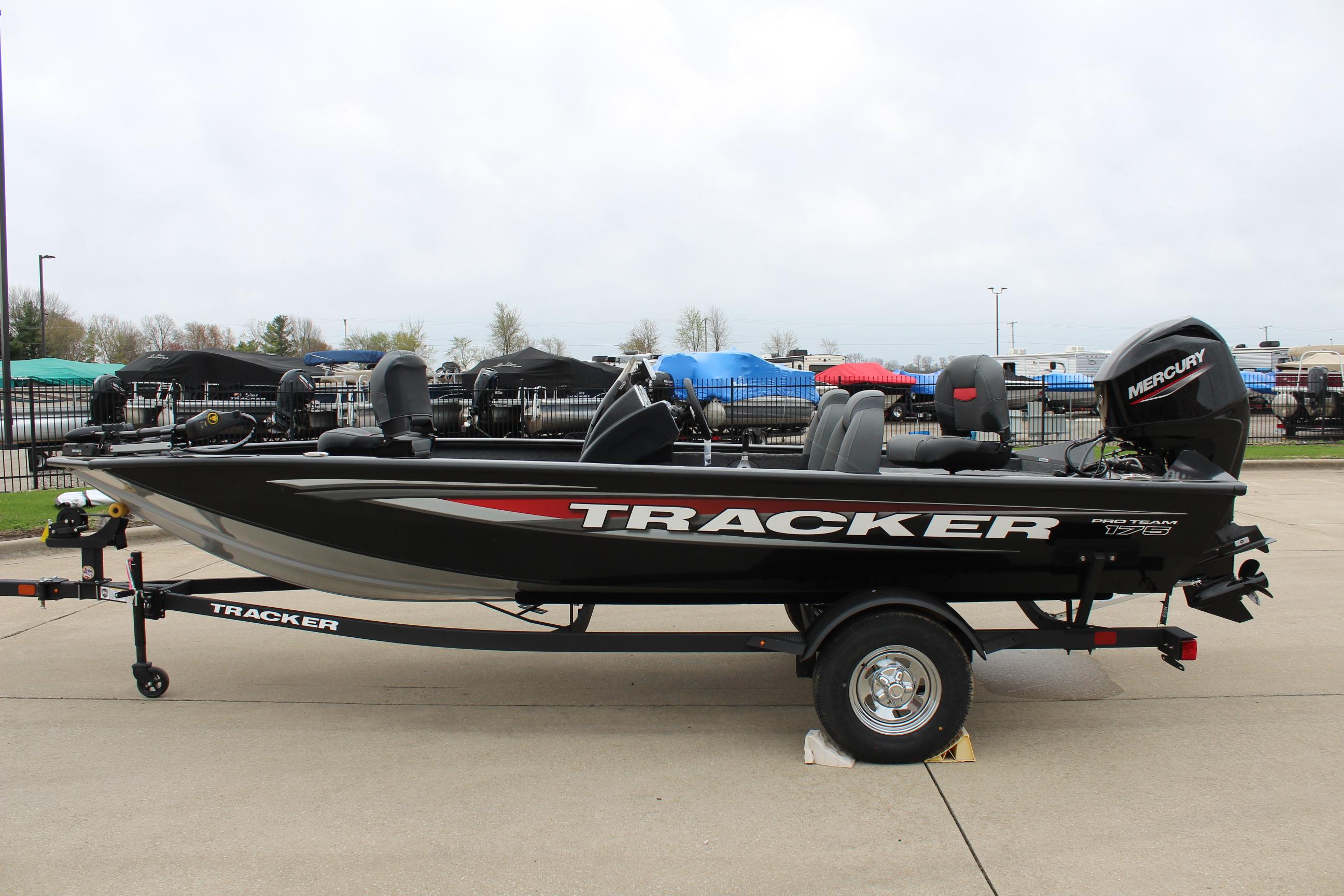 2025 Tracker Pro Team 175 Crappie Edition boat on trailer, side view.