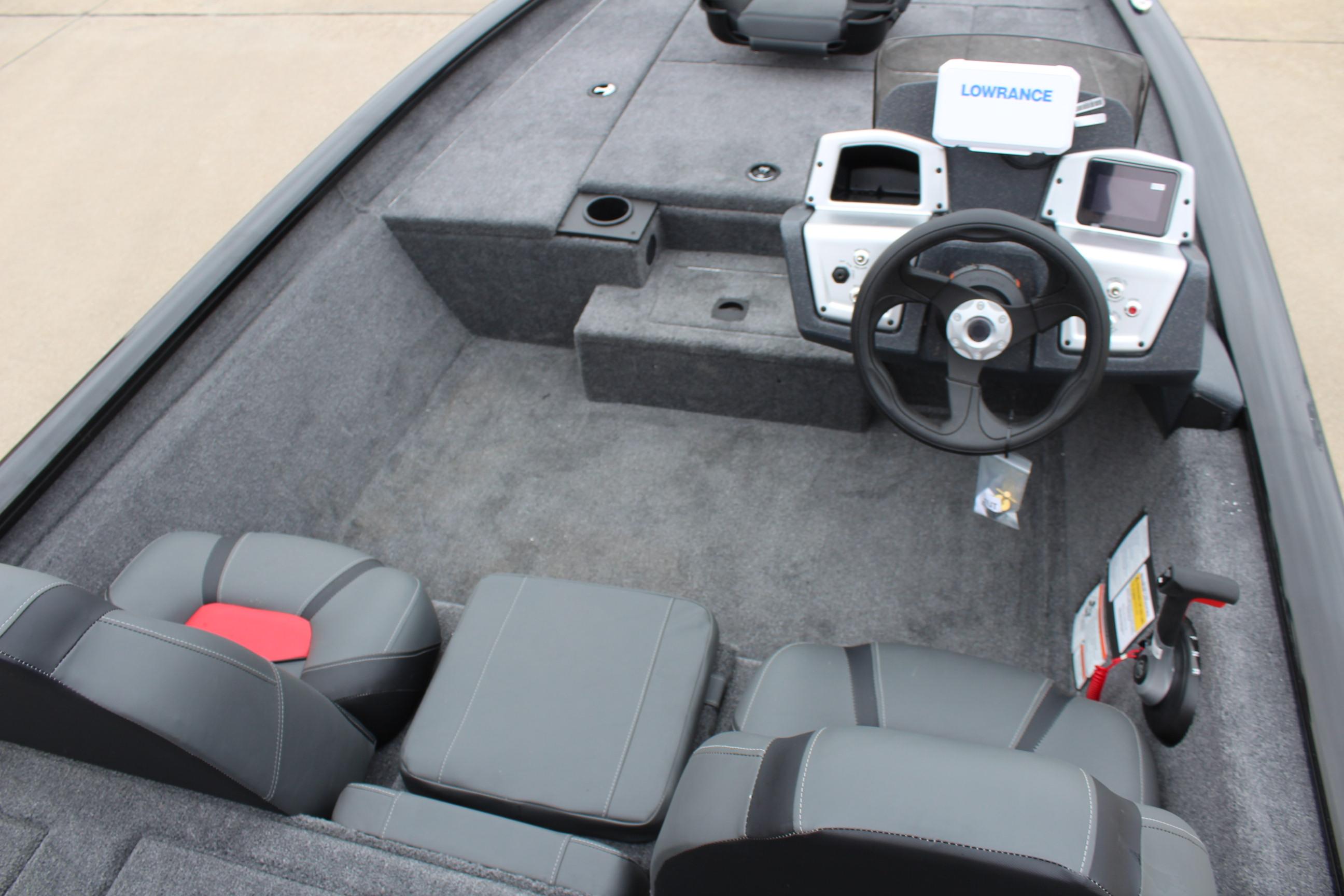 2025 Tracker Pro Team 175 Crappie Edition boat interior with steering wheel and seating.
