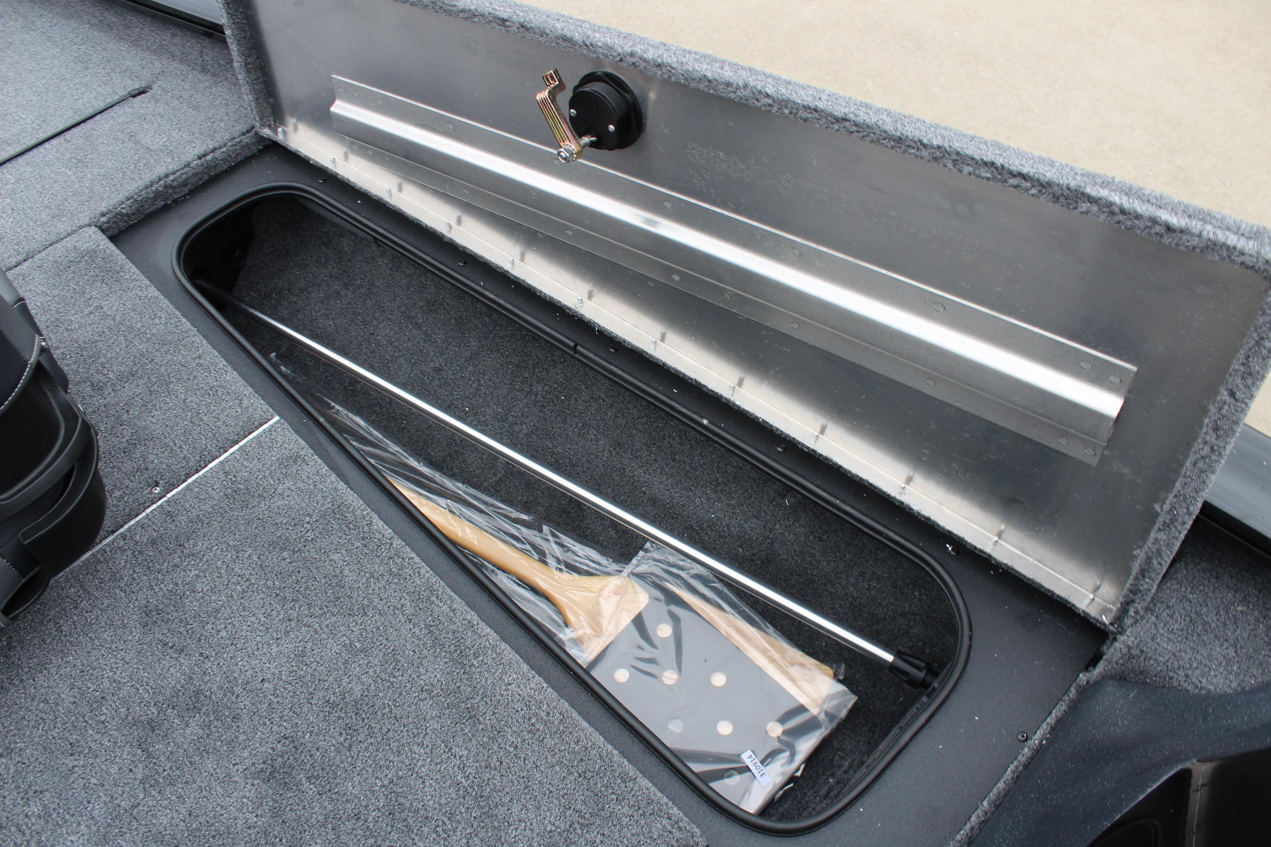 2025 Tracker Pro Team 175 Crappie Edition boat storage compartment with fishing rod holder.
