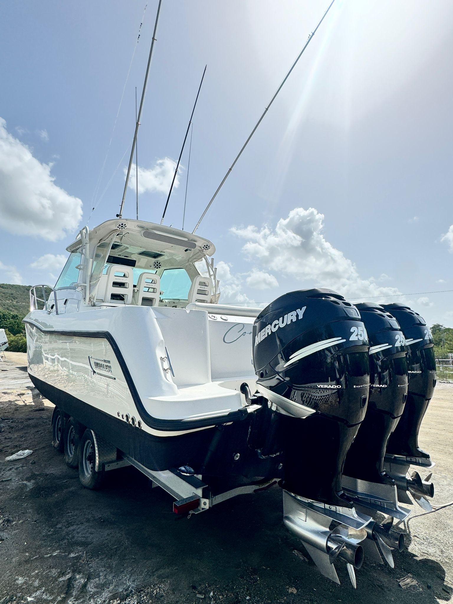 Boston Whaler-345 Conquest 2012 -PR-2012 Boston Whaler 345 Conquest with triple Mercury outboard engines on a trailer.-9446483 | Thumbnail